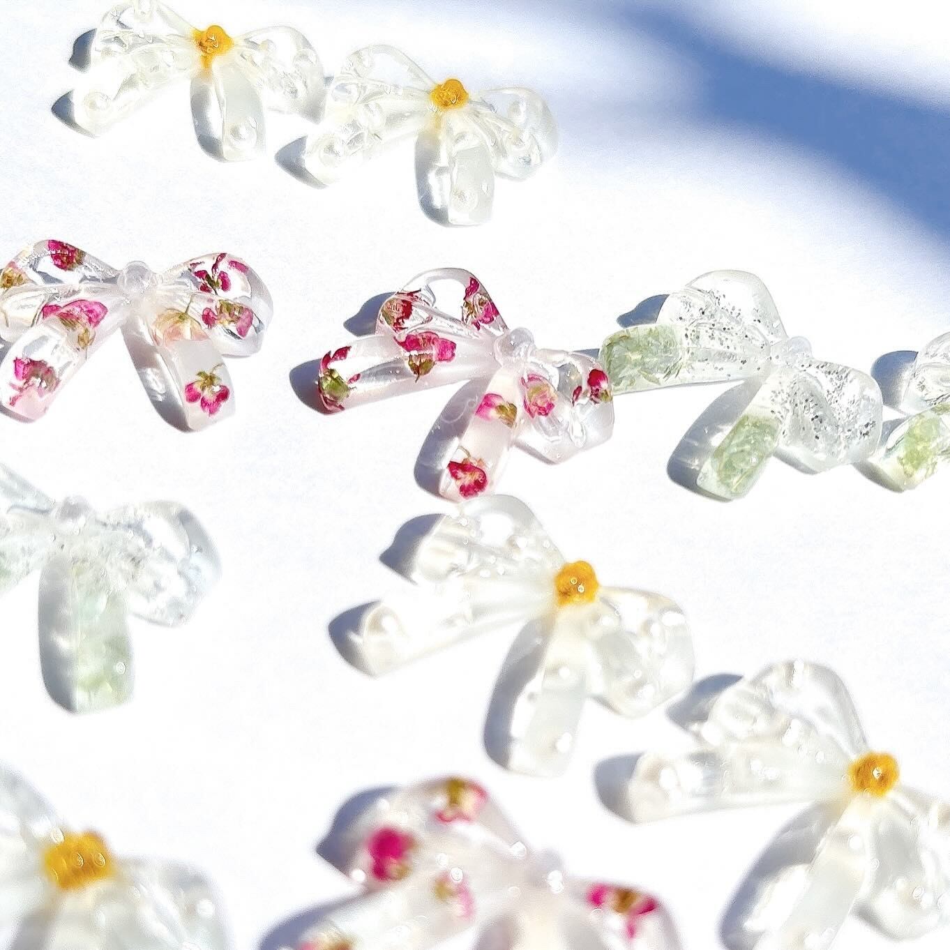 ribbon ( alyssum ) ピアス / イヤリング