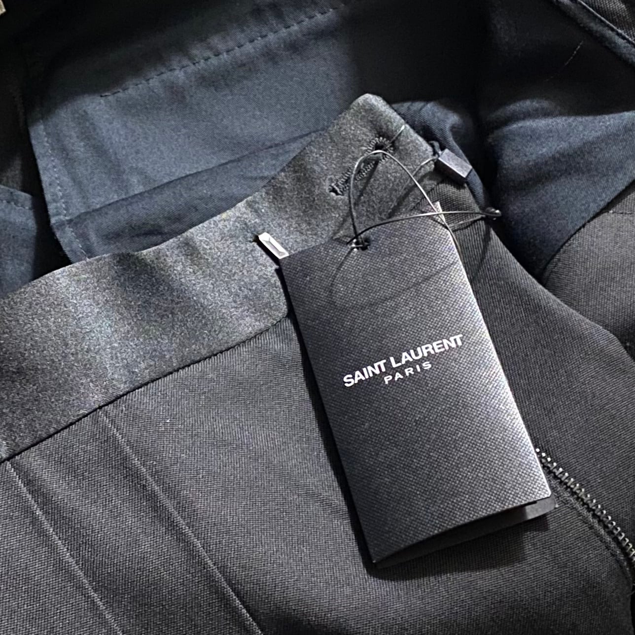 SAINT LAURENT PARIS pleated black “hakama” pants | NOIR ONLINE