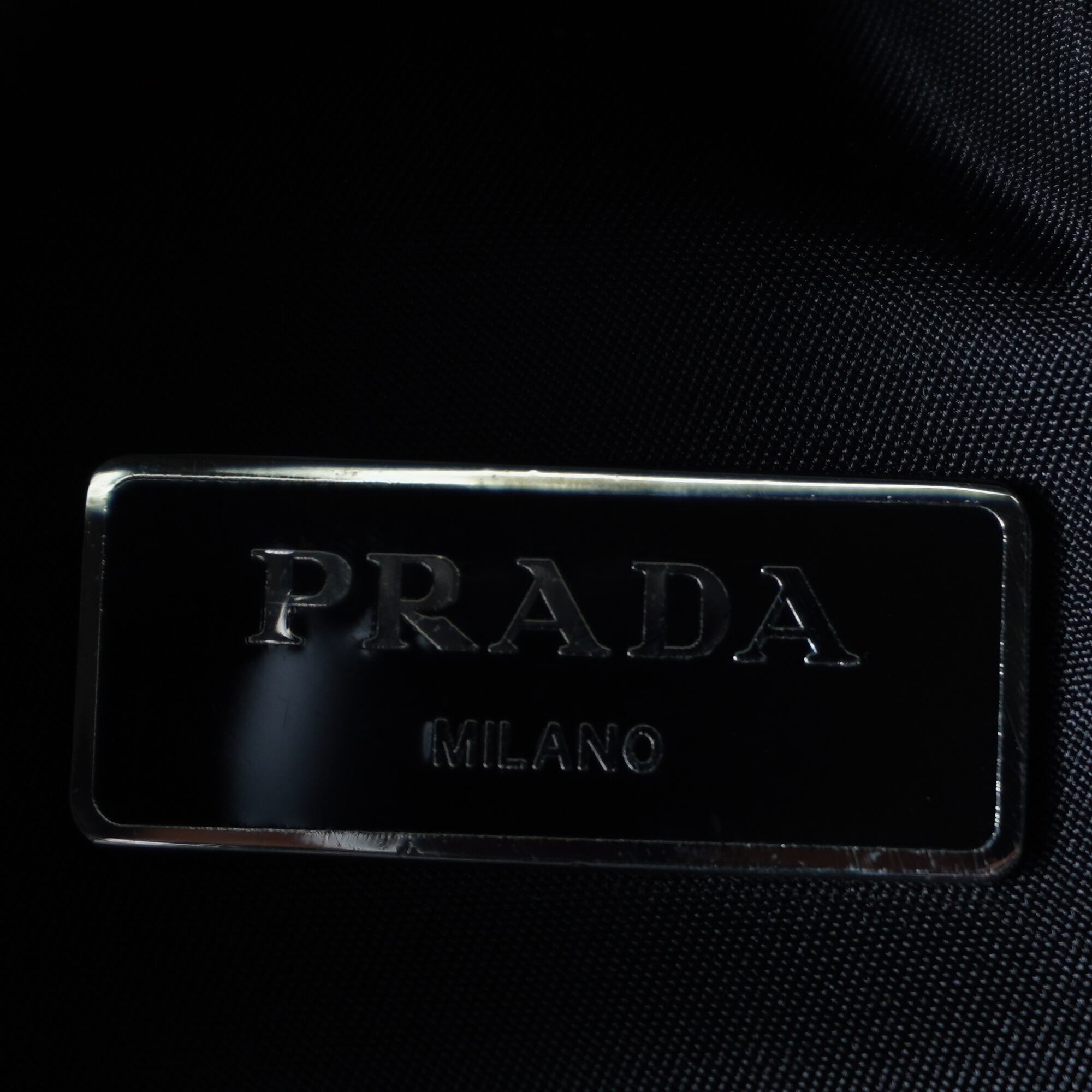 PRADA】プラダ ”V136”三角プレートロゴバックパックNERO black | MIXHIVE