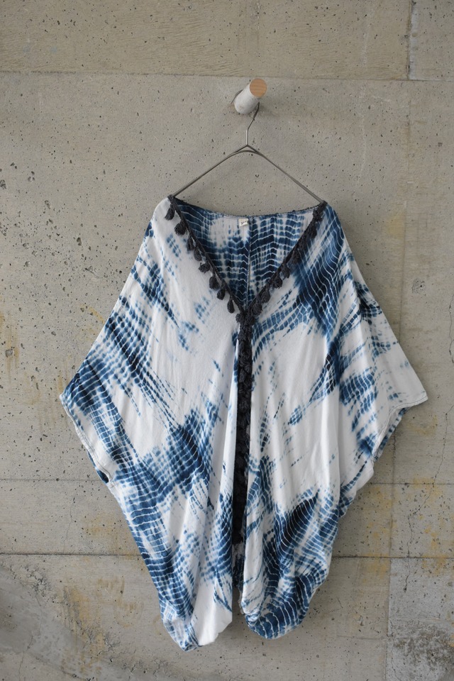Shiny, flowy half-button top