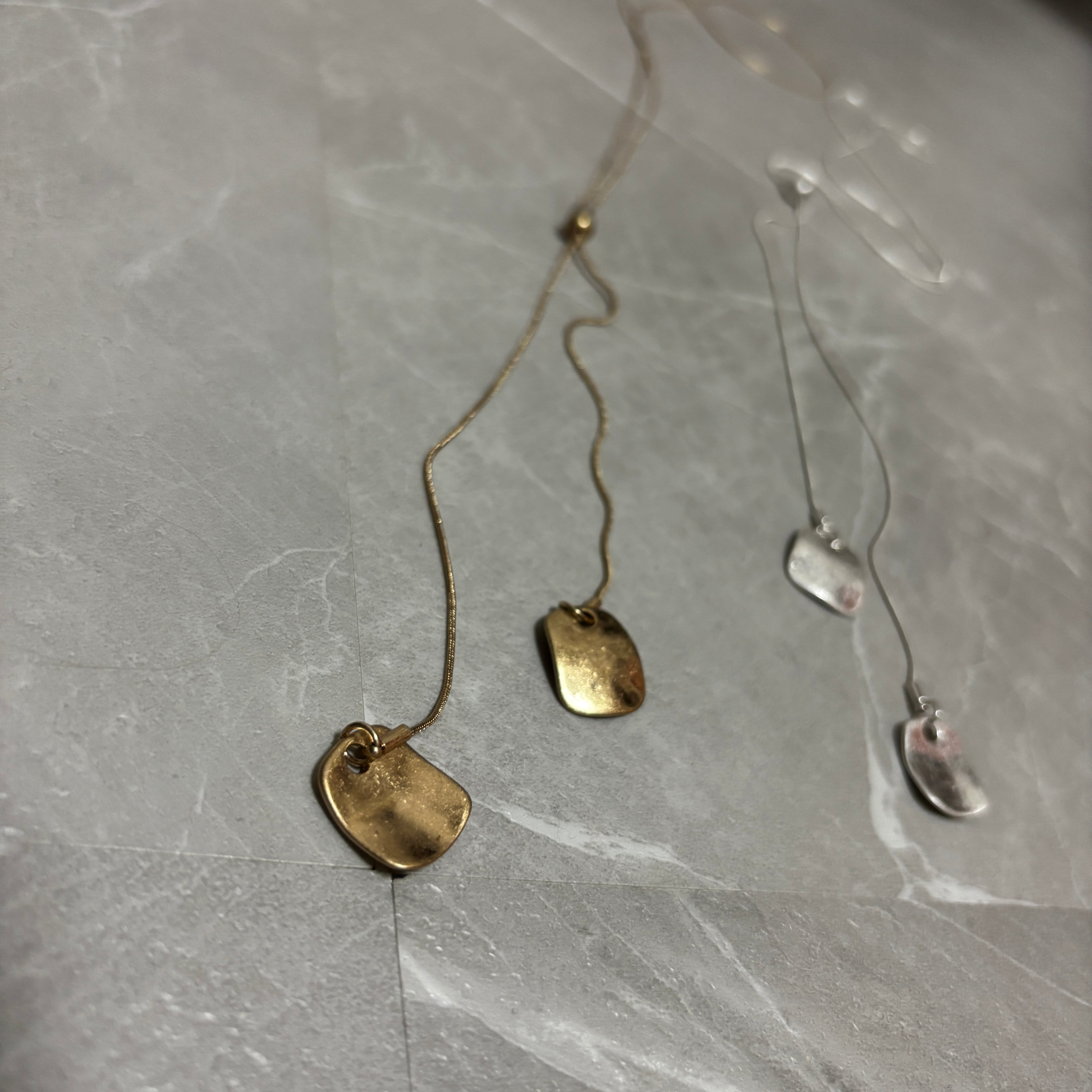 double charm loop tie necklace