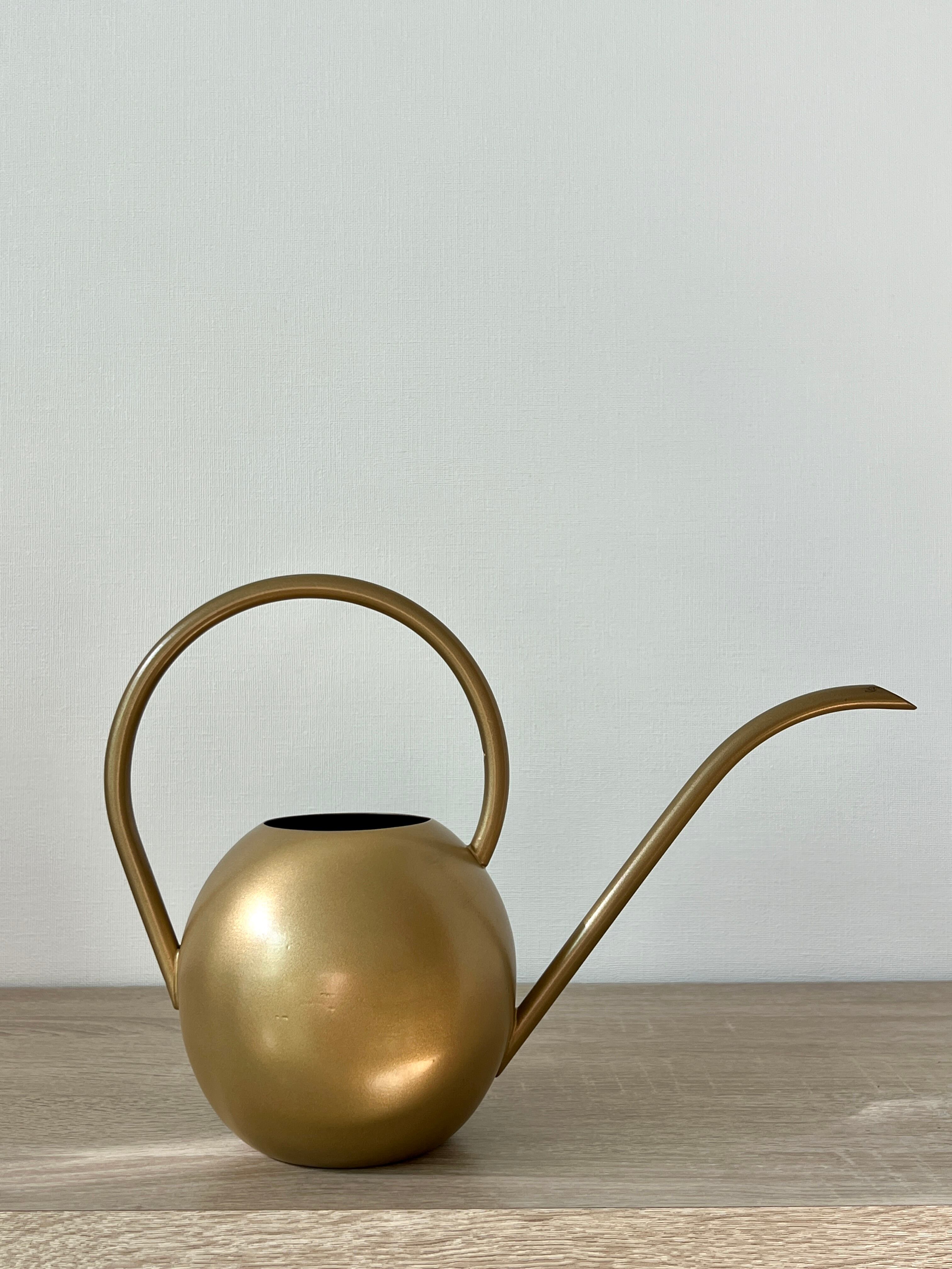 Gold watering can
