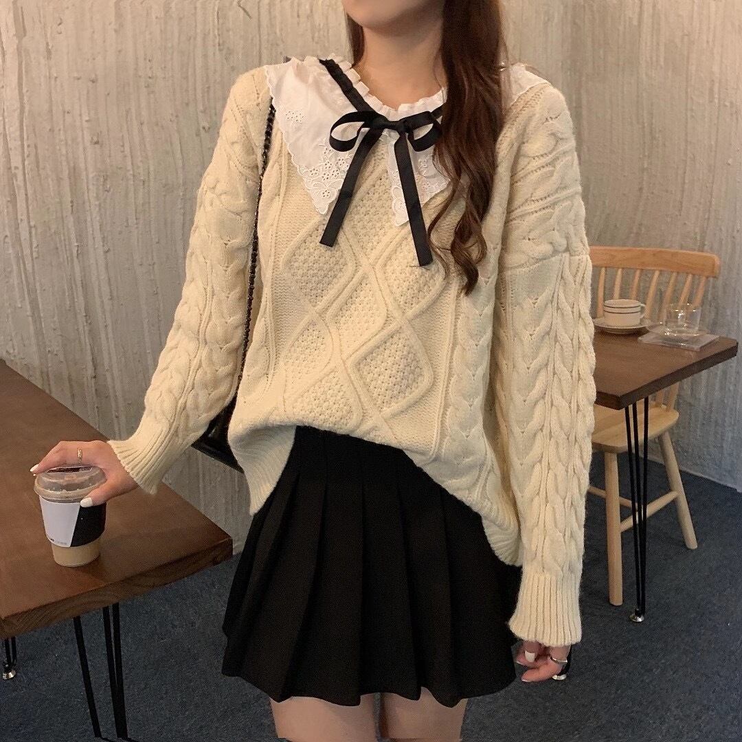 フロントリボンケーブル編みニット