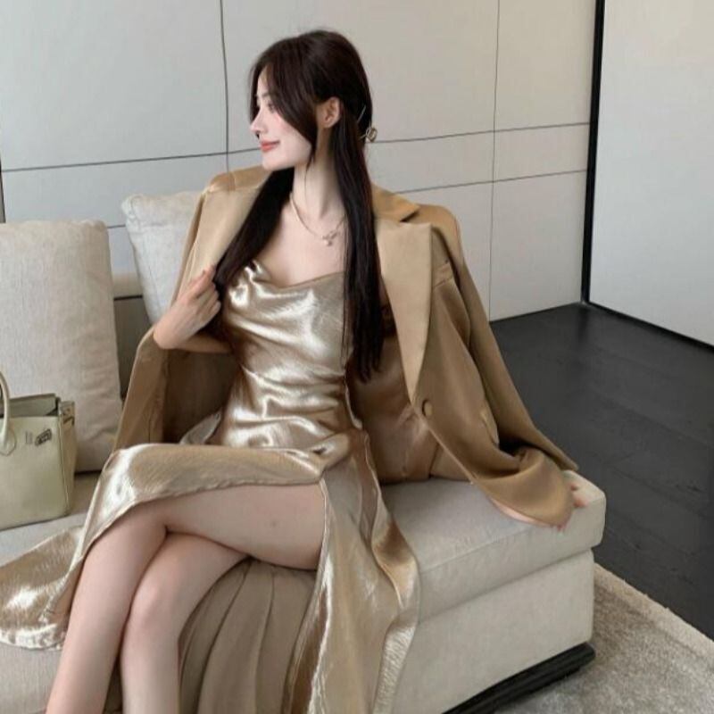 【新作】【送料無料】 Yu Jie Feng ストリートセクシーなシャンパンカラーサスペンダードレス女性の秋と冬のハイエンドセレブ気質スリットロングスカート 0122935987340