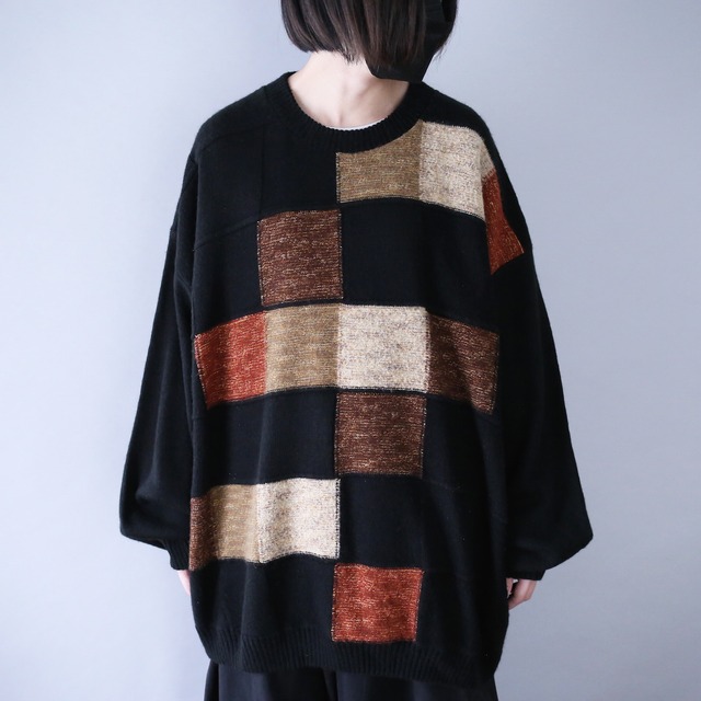 black base random block pattern over silhouette knit