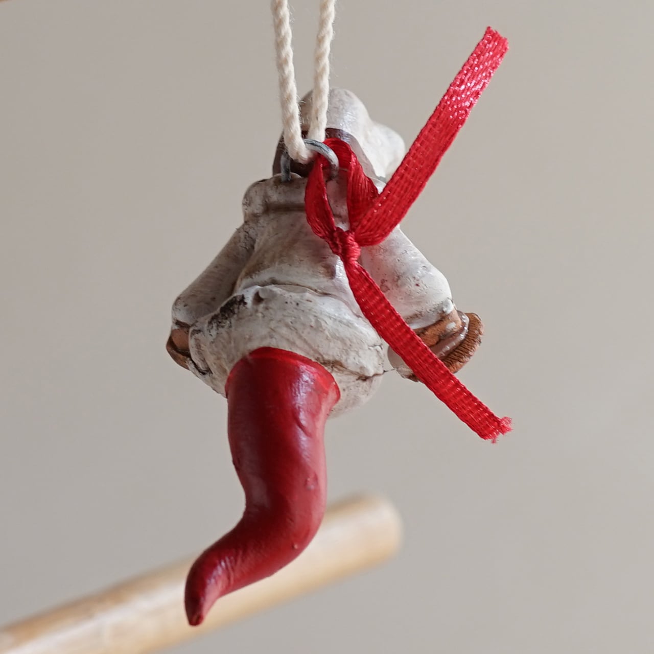 ナポリの幸運のお守り！ピザを持つプルチコルノ | ルカニア