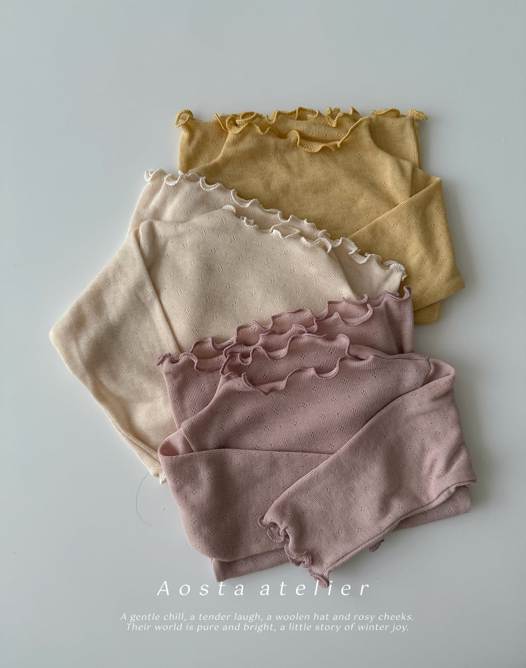 【予約】aosta 透かし柄フリルカットソー