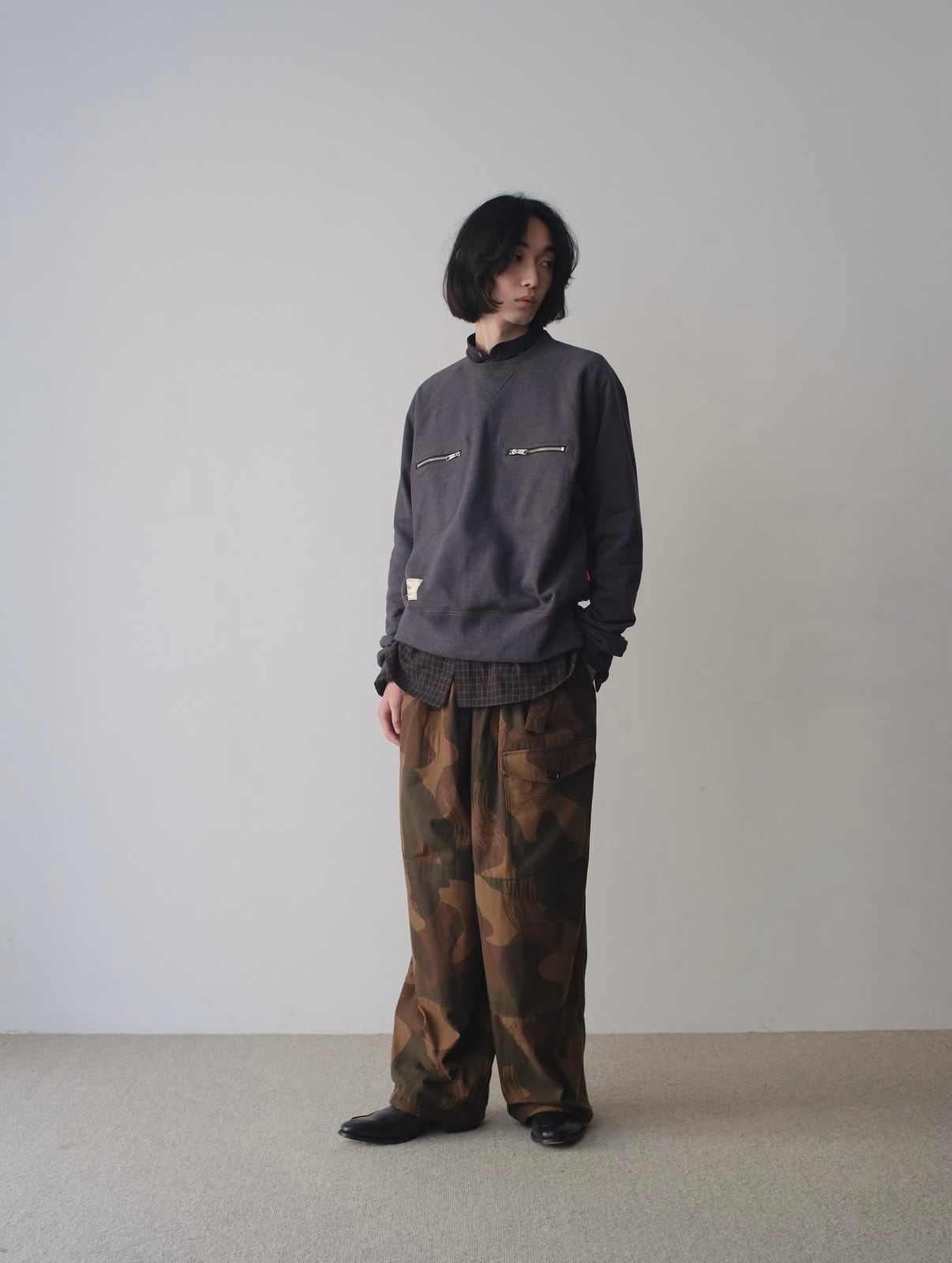 YUKI HASHIMOTO | TWISTED FLARED PANTS | BLACK | HOWDAY