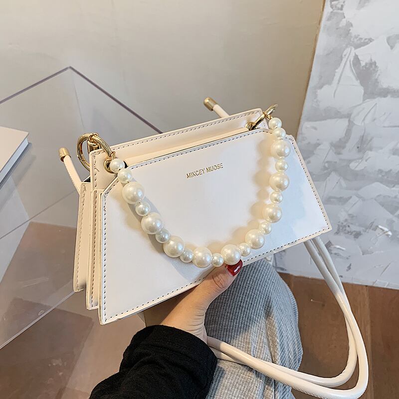 メッセンジャーバッグレディーススモールバッグ2020ニューウェーブサマーファッションパールショルダーバッグネットレッドオーシャンワイルド脇の下バッグ Tiancai_Wing_Bag7923041