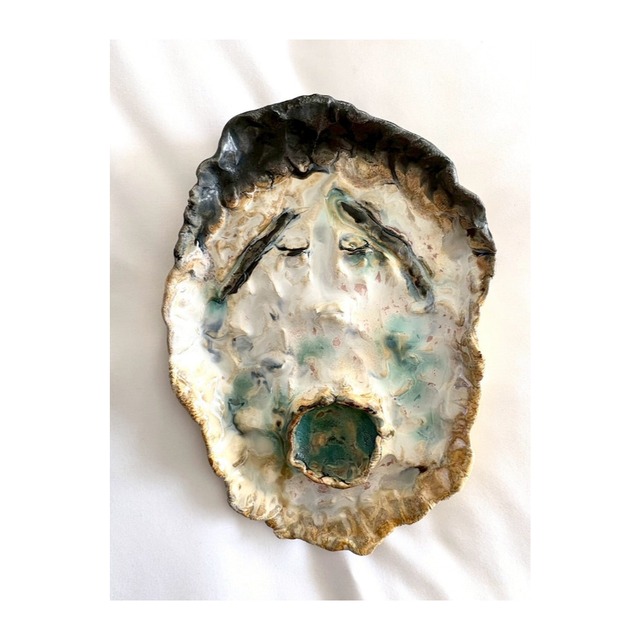 アラキドン　口内の青い皿としての像