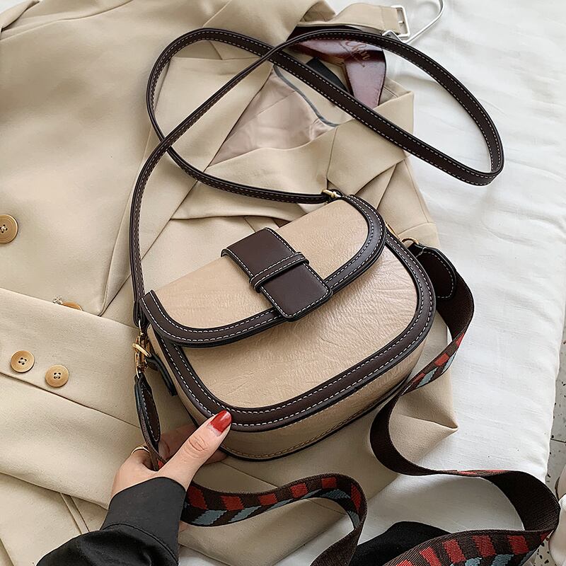 秋冬レトロスモールバッグ女性2020新しい流行のファッションネットレッドワイドショルダーストラップシングルショルダーメッセンジャーバッグワイルドサドルバッグ Tiancai_Wing_Bag87341595019