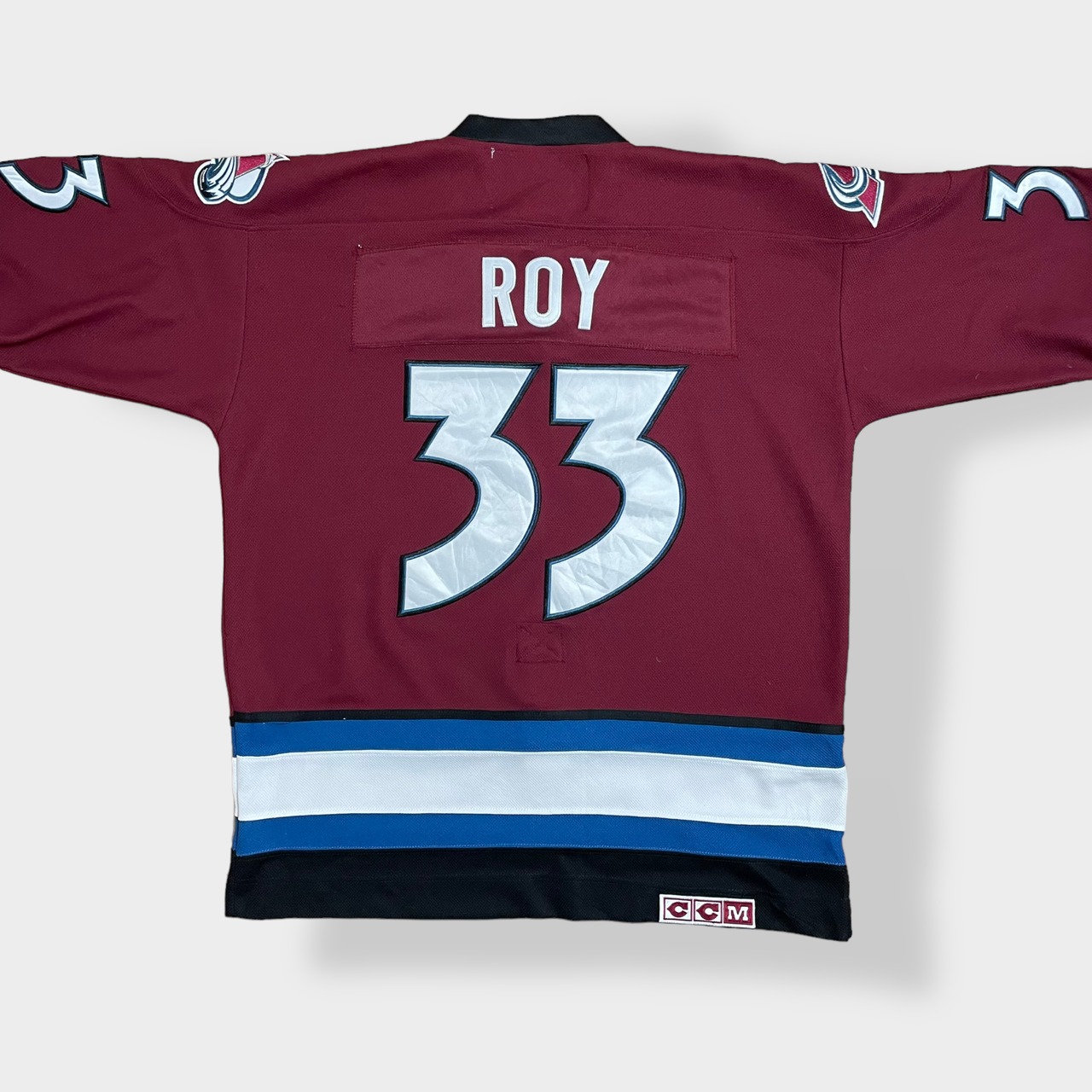 【CCM】カナダ製 NHL コロラドアバランチ オフィシャル アイスホッケー ゲームシャツ COLORAD AVALANCHE VINTAGE HOCKEY メッシュ 刺繍 ナンバリング 33 バックネーム ビッグシルエット Officiel US古着