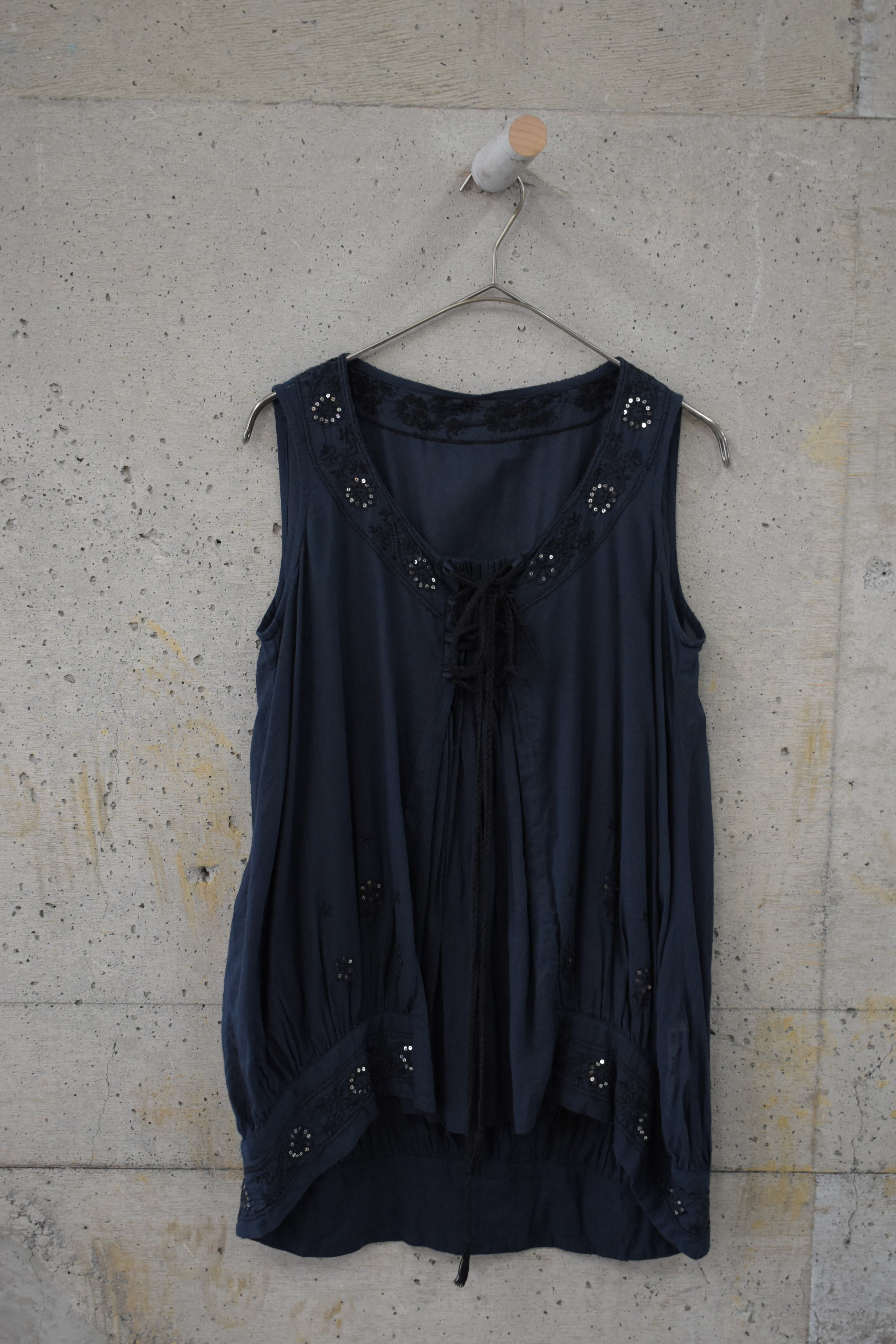 Black sleeveless top with sequins