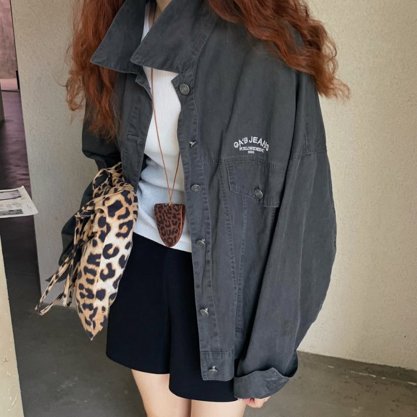 embroidered logo over jacket J00019