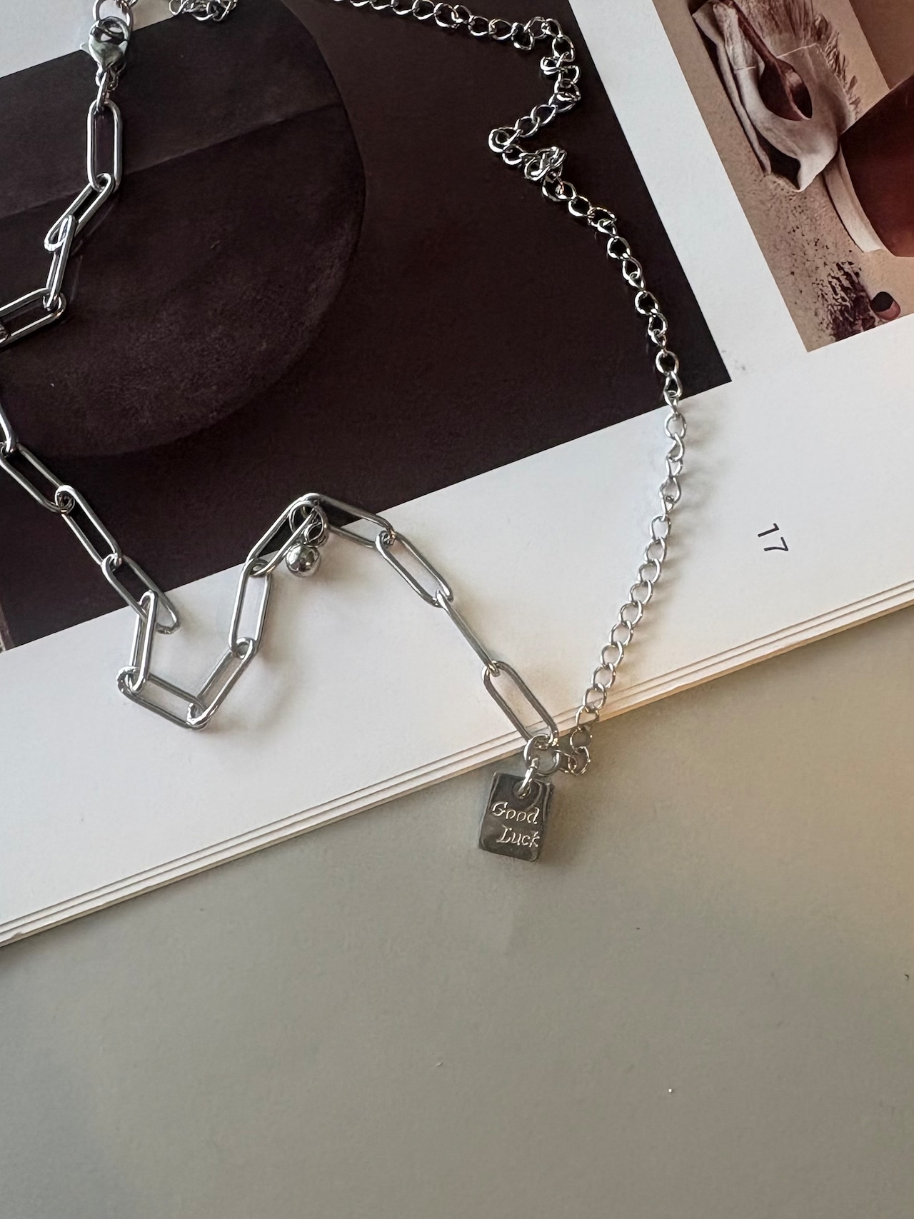 ss good luck charm necklace