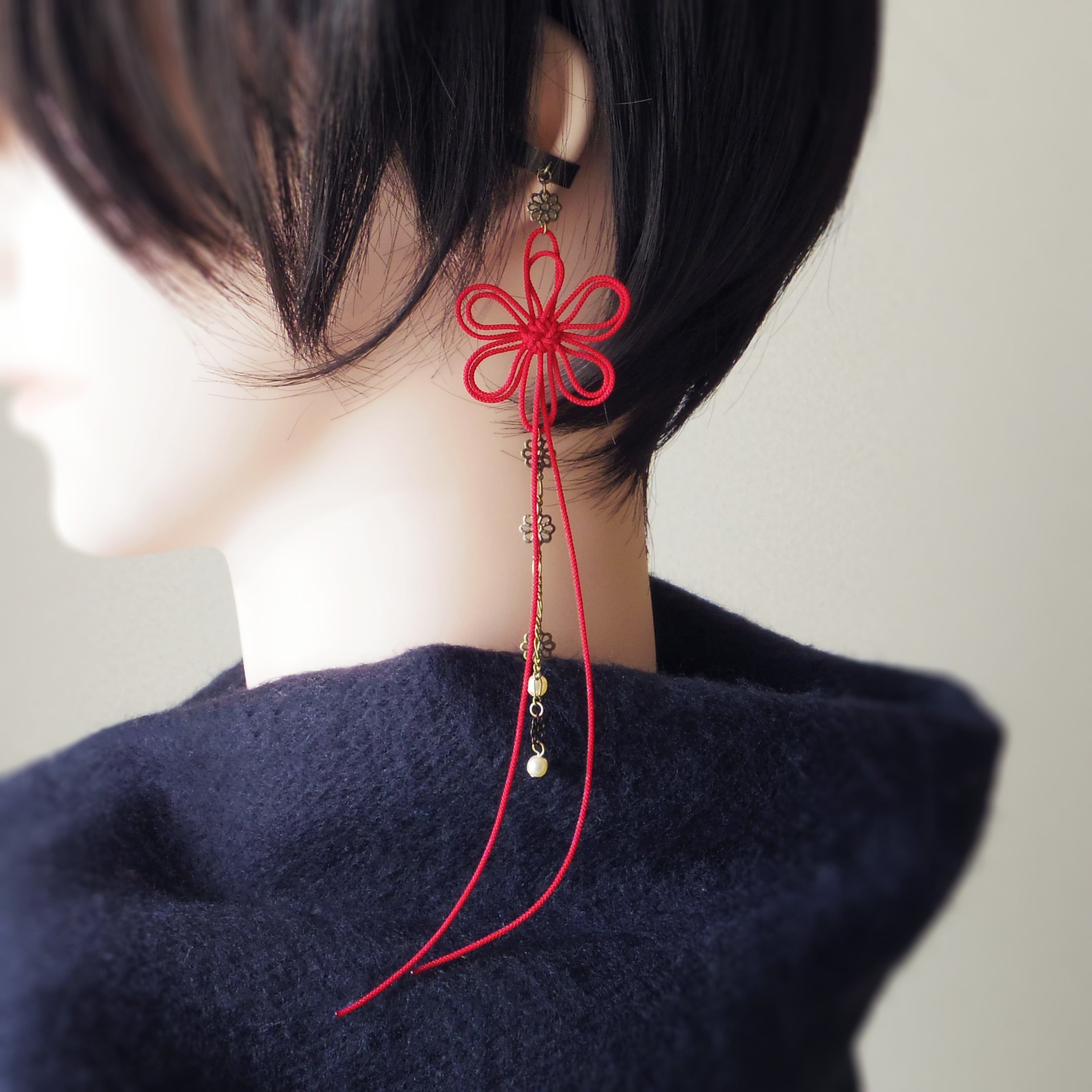 かたっぽイヤーカフ「ひとあしこつり・浮」 | nuta design