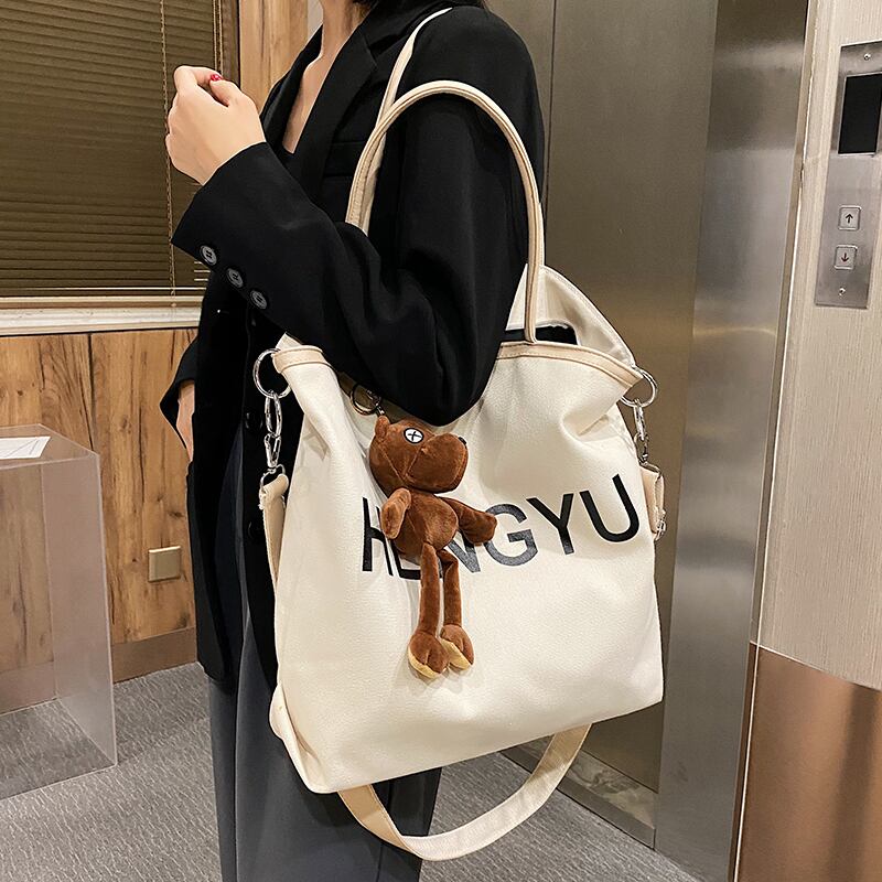 大容量バッグハンドバッグ2020新しい流行のファッションワイルドインメッセンジャーバッグネットレッドキャンバスポータブルトートバッグ Tiancai_Wing_Bag63495127264