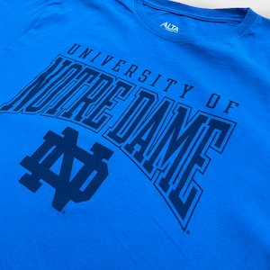 【ALTA GRACIA】カレッジ ロゴ Tシャツ ノートルダム大学 University of Notre Dame プリント 半袖 LARGE ブルー us古着