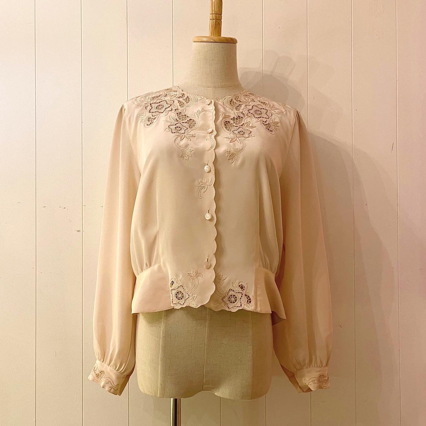 pale pink embroidery peplum blouse