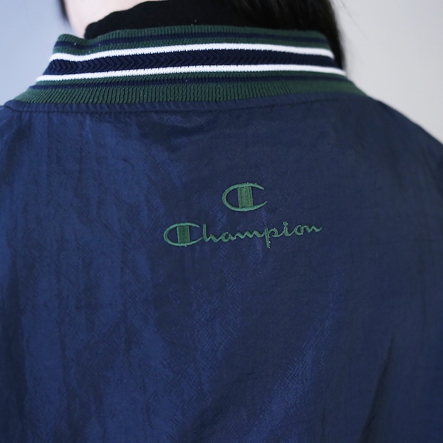 "Champion" front logo design over silhouette nylon pullover