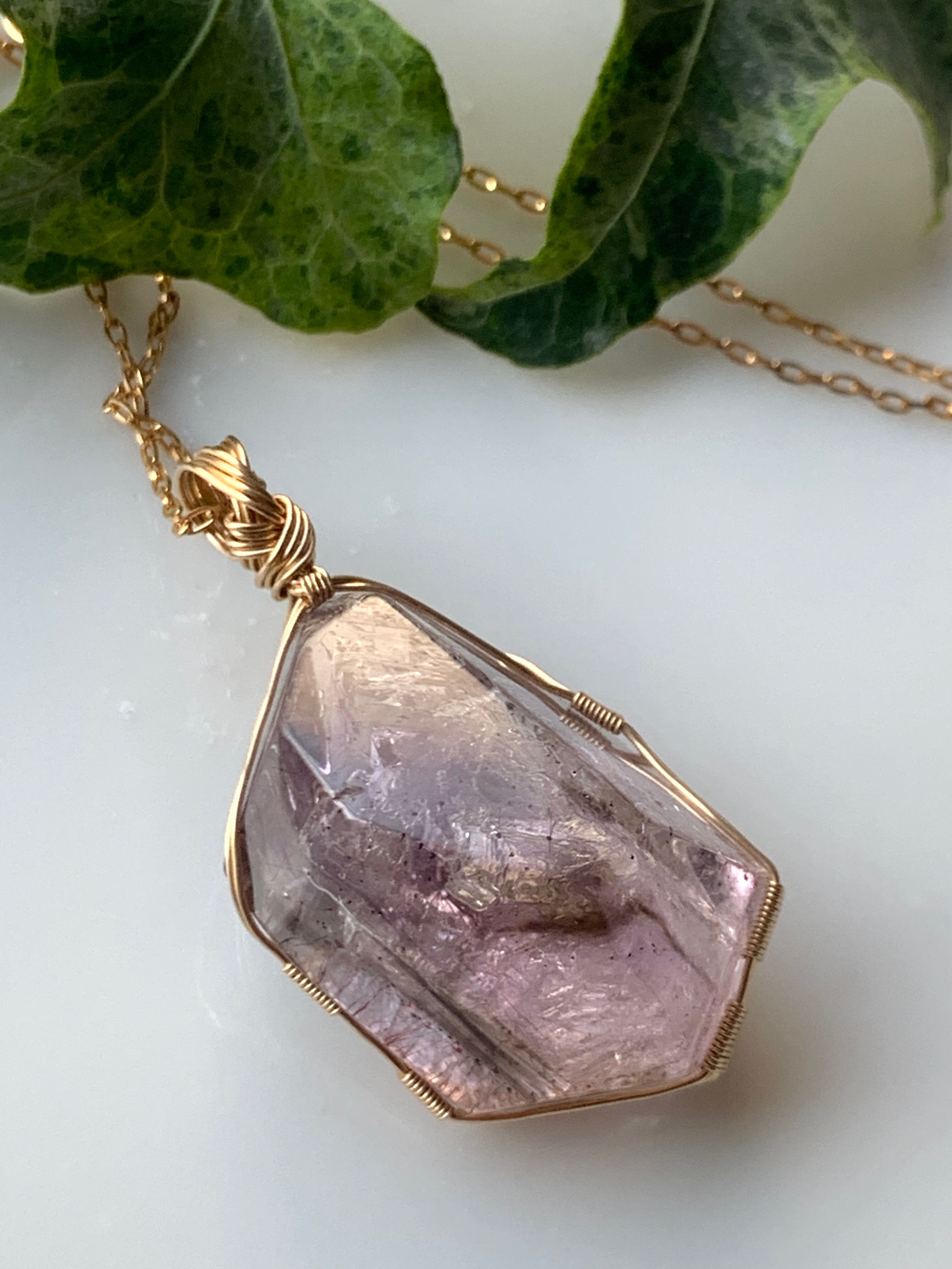 希少ブラジル産水入りスーパーセブン原石74×24×22mm タントリックツイン