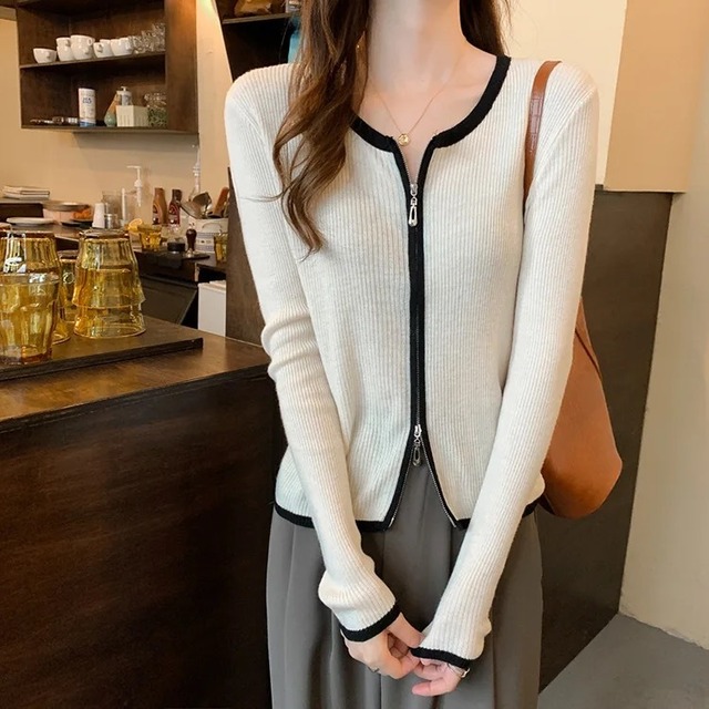 バイカラージッパートップス