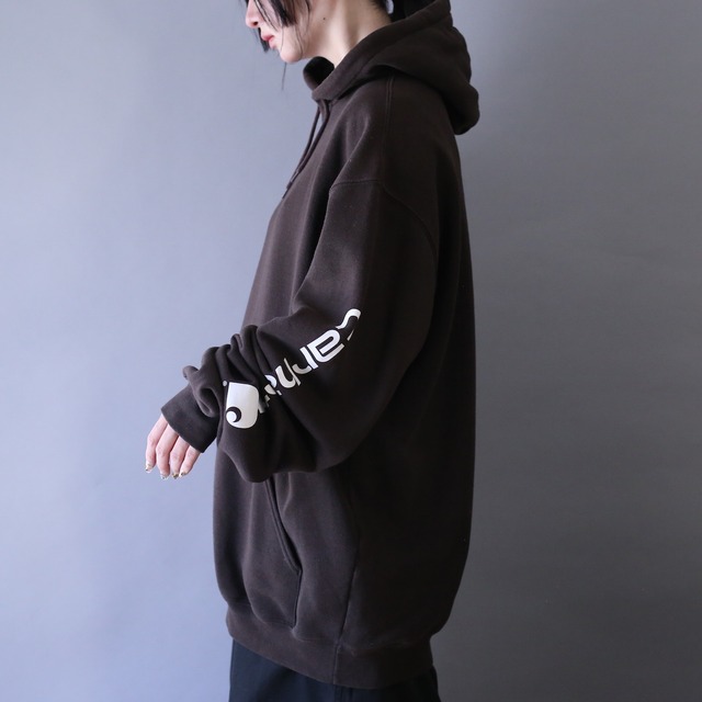 "carhartt" sleeve printed design over silhouette brown parka