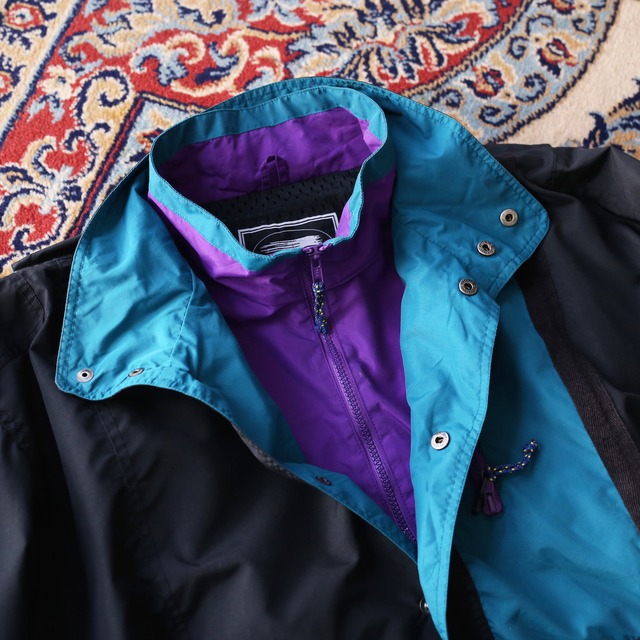 wide silhouette front pocket design half-zip nylon pullover