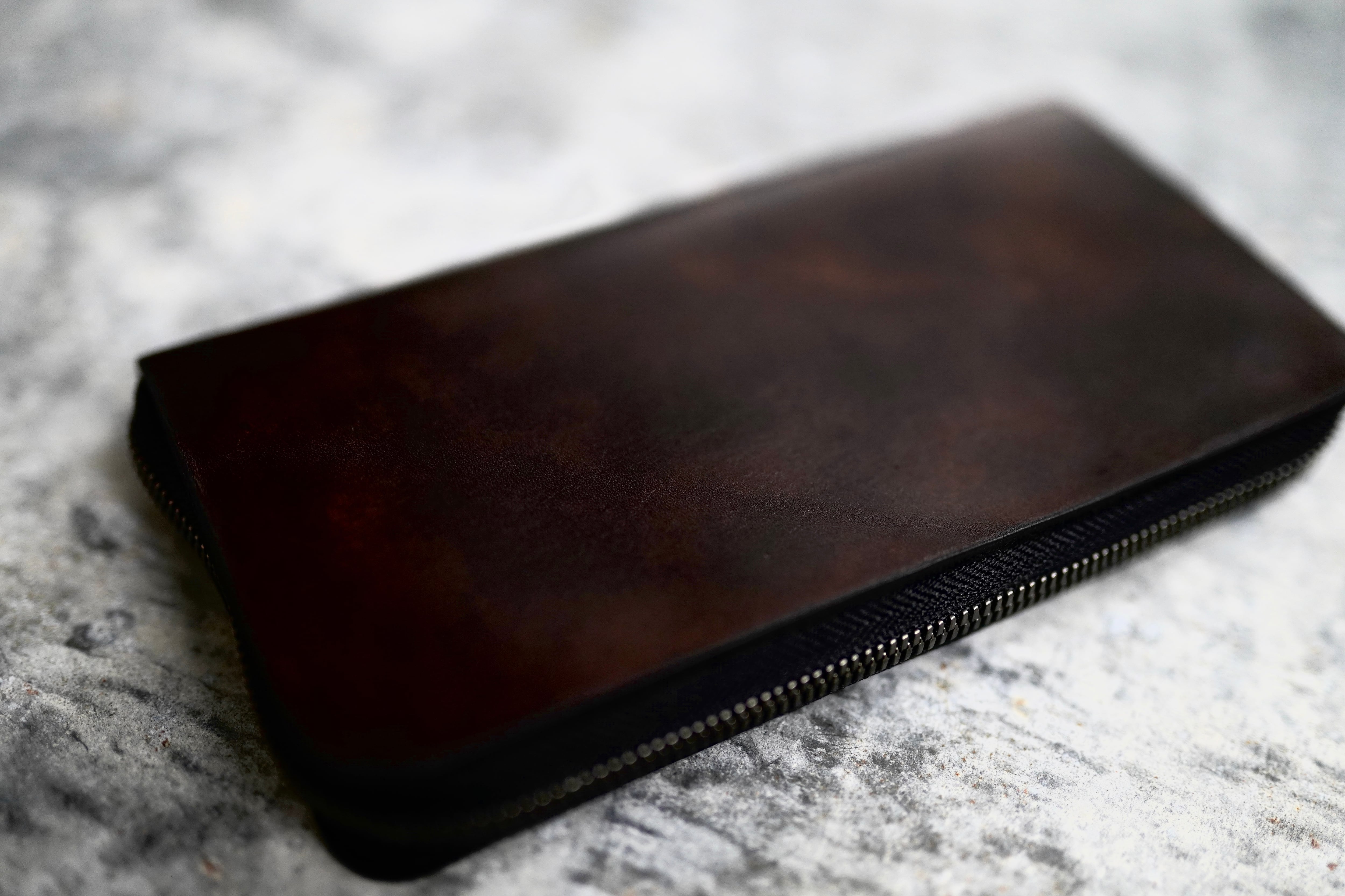 NAGI round zip wallet LONG museum calf | una