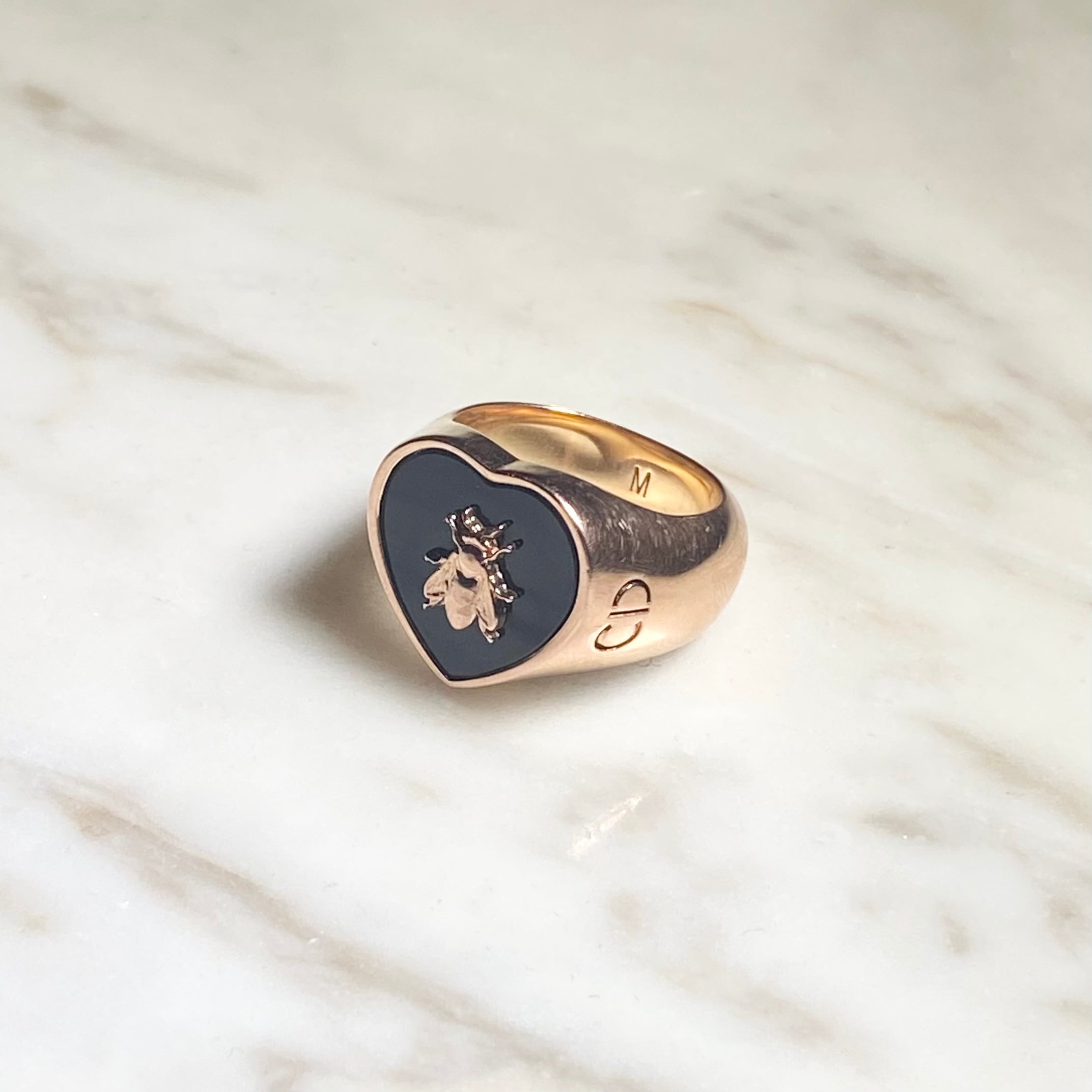 CHRISTIAN DIOR gold color signet ring set with onyx “lucky CHRISTIAN DIOR gold color signet ring set with onyx “lucky