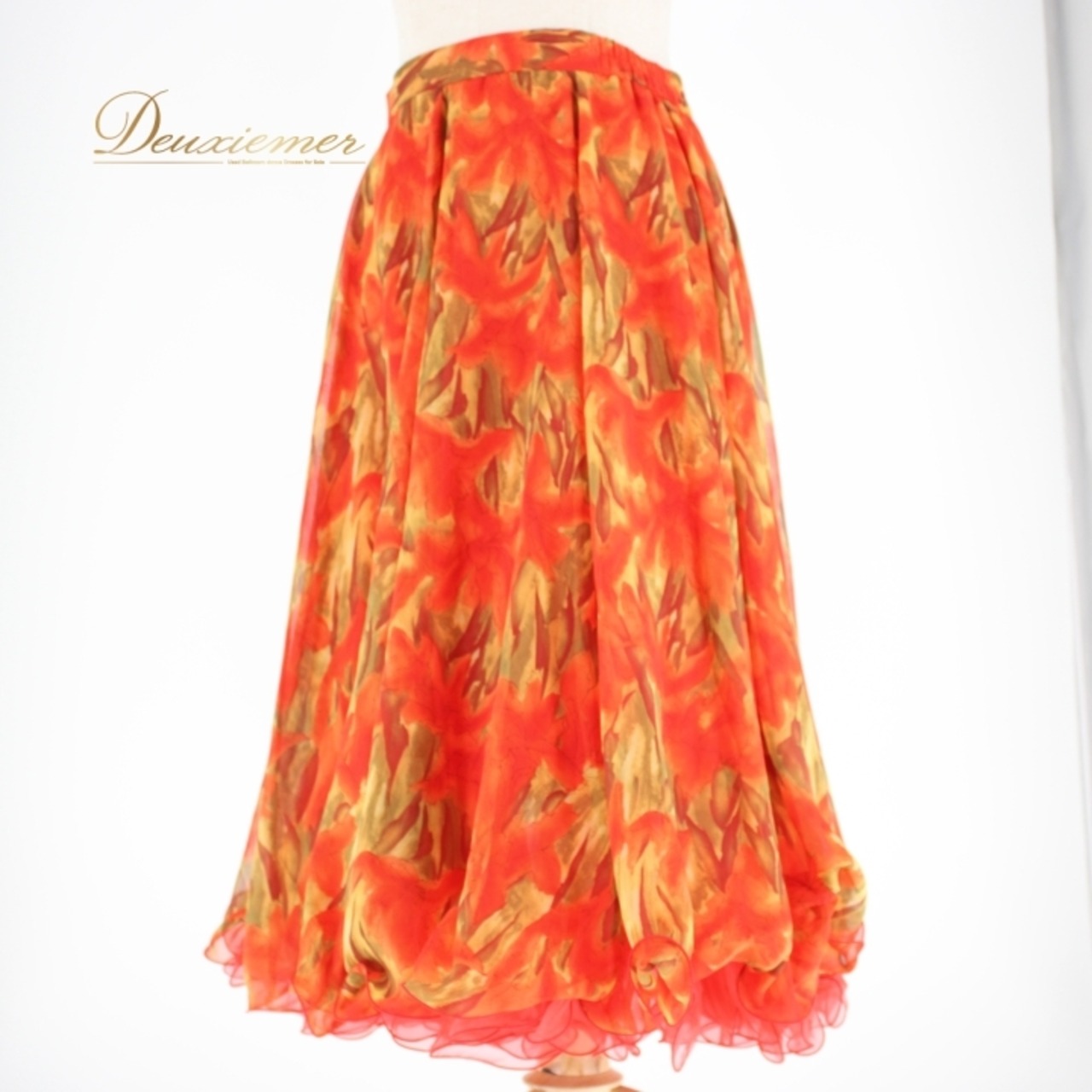 社交ダンス 衣装 スタンダード スカート レッスンウェア オールシーズン オレンジ系 U:NA ユーナ 練習着 派手 レッド系 花柄 かわいい 秋冬 スカート丈71cm ウエスト33cm～ ポリエステル製 女性用 おしゃれ カジュアル 練習用 パーティー 半袖 サイズM ふんわり 二重スカート かわいいデザイン 特別な日 未使用