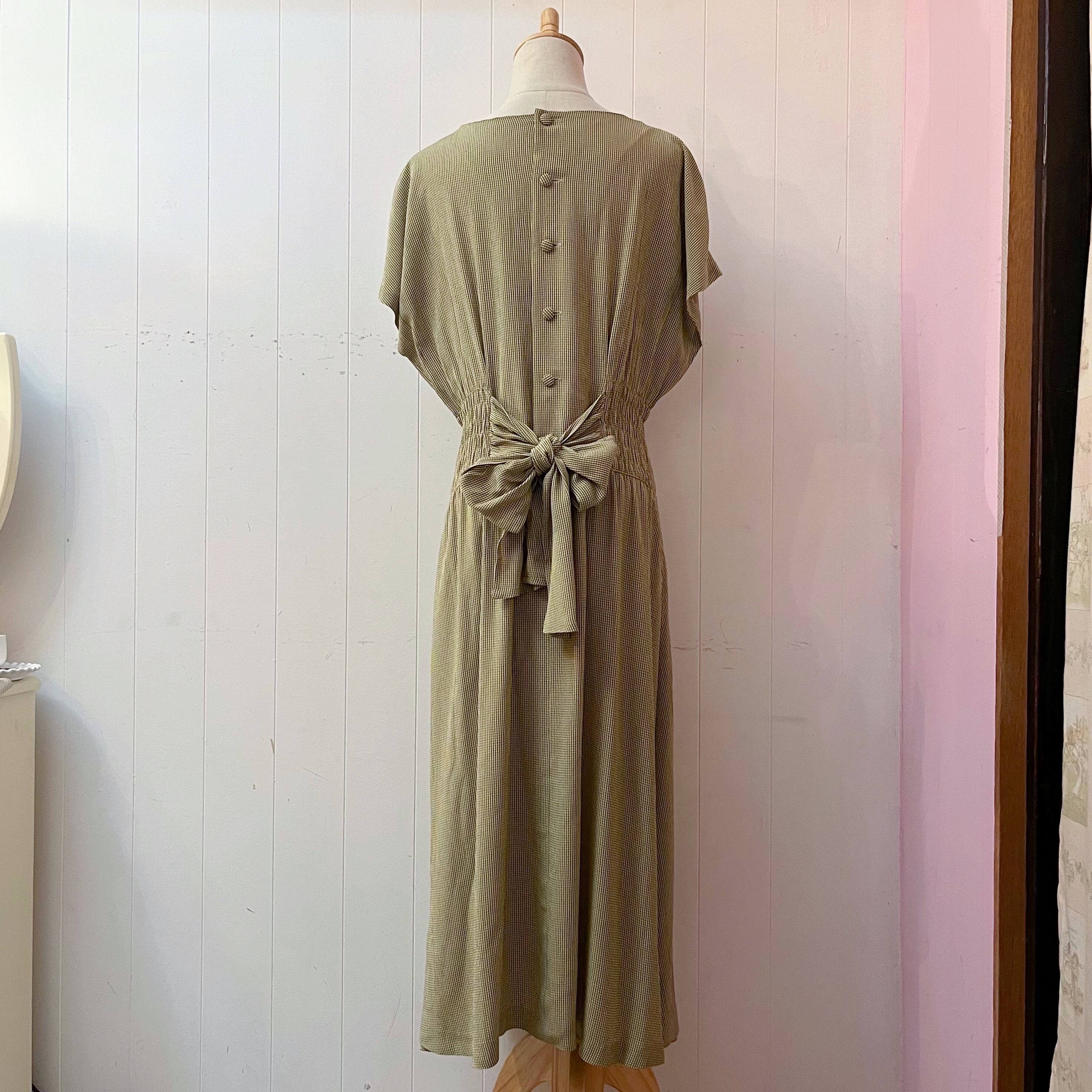 green check back button one-piece