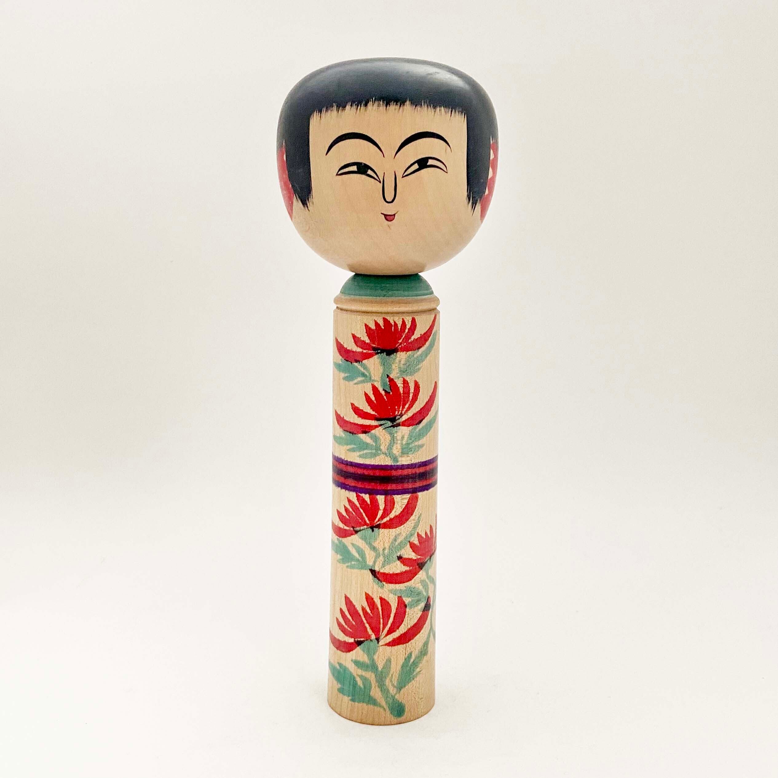 肘折系 / 佐藤昭一工人(肩緑に縞の帯)