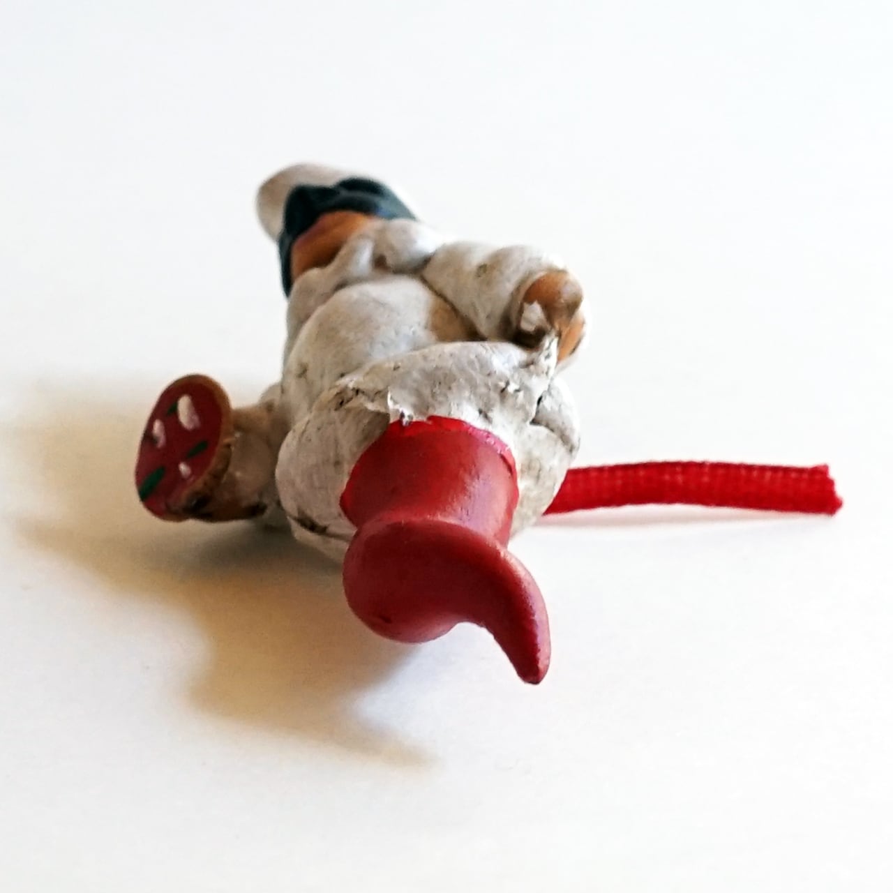 ナポリの幸運のお守り！ピザを持つプルチコルノ | ルカニア