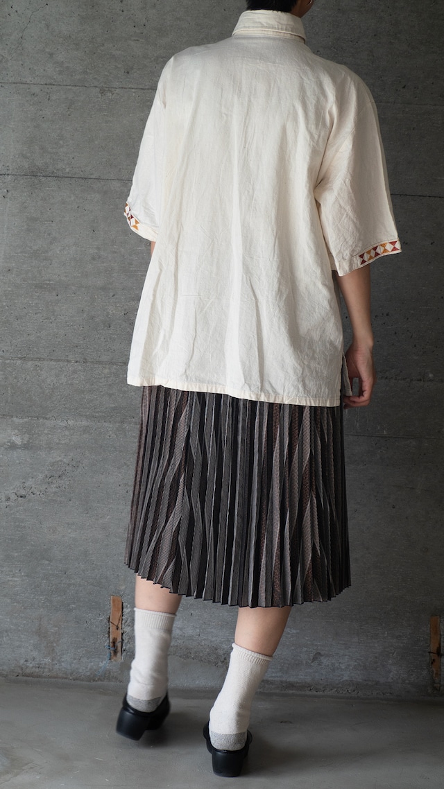 "Sirari Creaciones" used Embroidery shirt