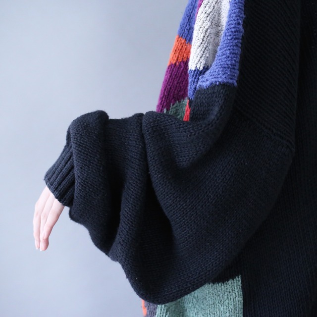 black base colorful art pattern over silhouette knit