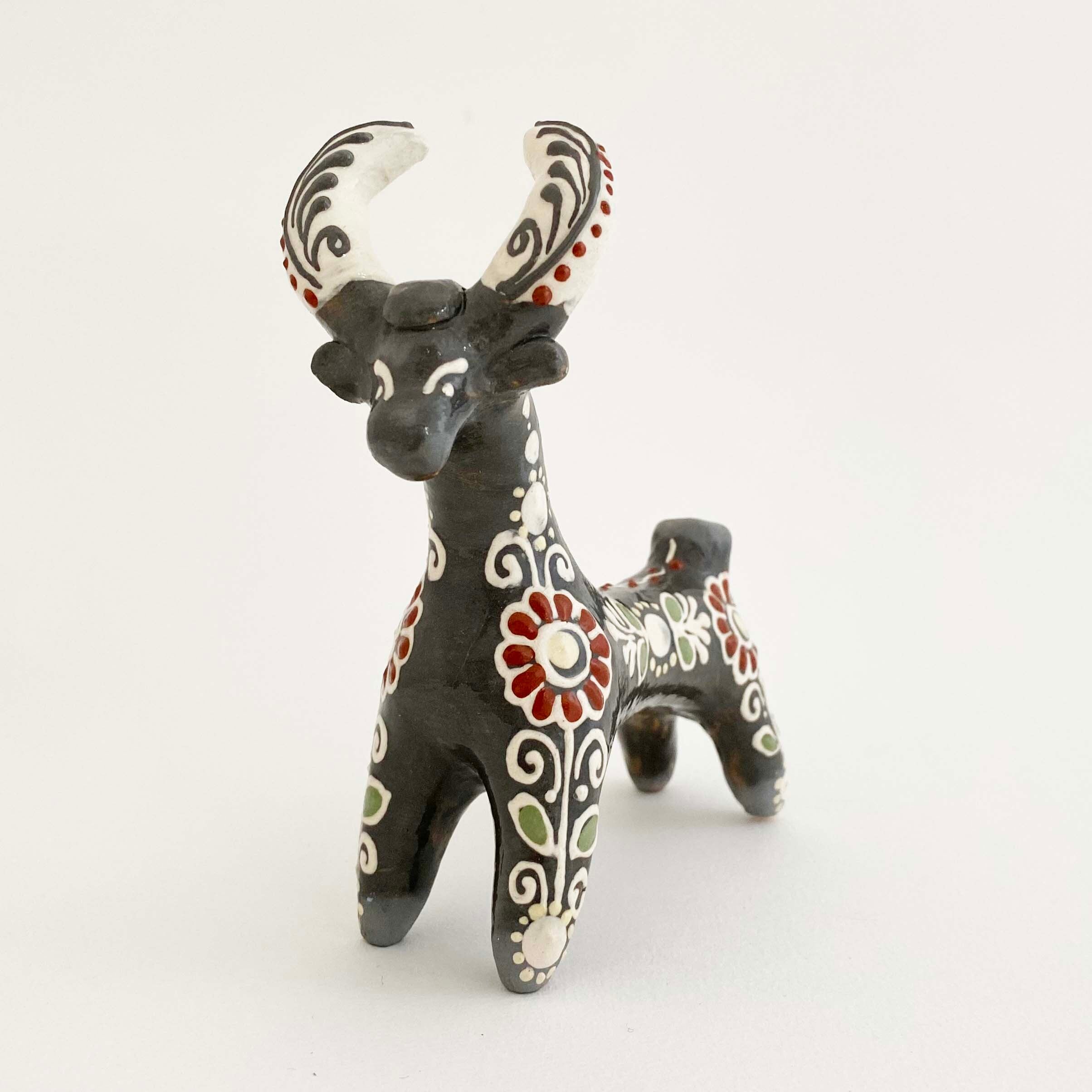 ウクライナ産 オピシュニャ土人形(牛 黒色)