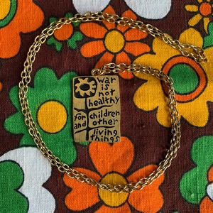 1968y "war is not healthy for children and other living things" Pendant 4