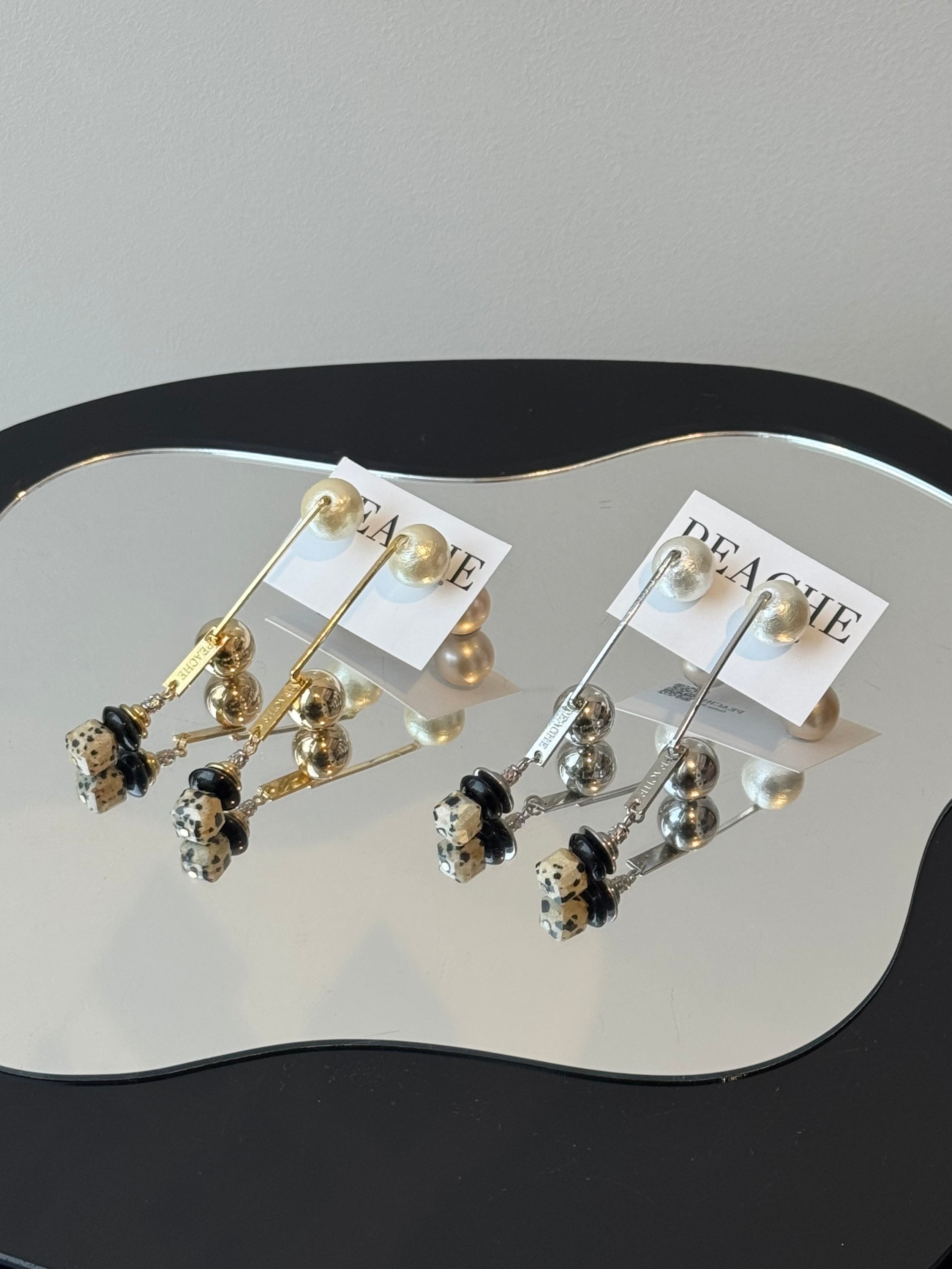 long stick dot drop vertical design