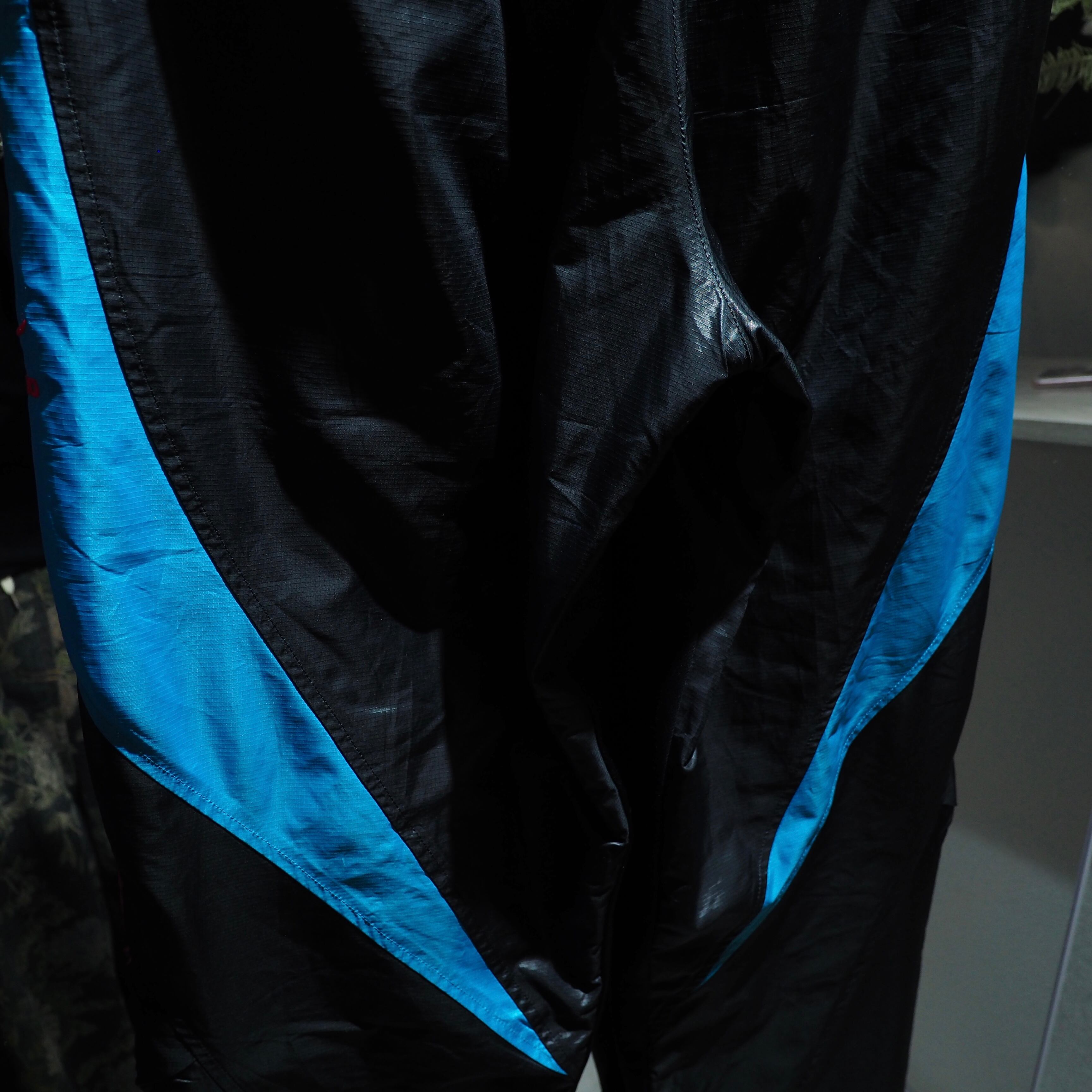 Dark Pink × Neon Blue color panel Switching Cyber track pants