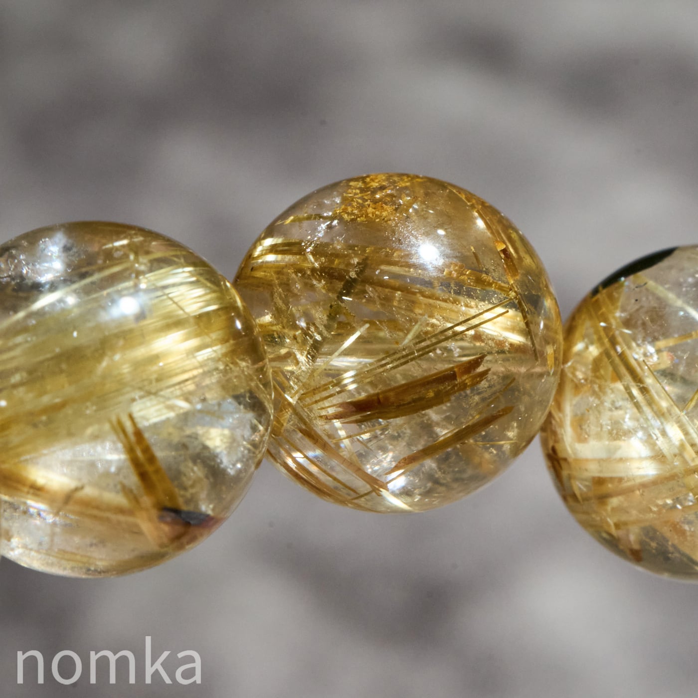 黄金の鼓動】ブラジル産 ルチルクォーツ(ヘマタイト共生/AAA) 12.5mm