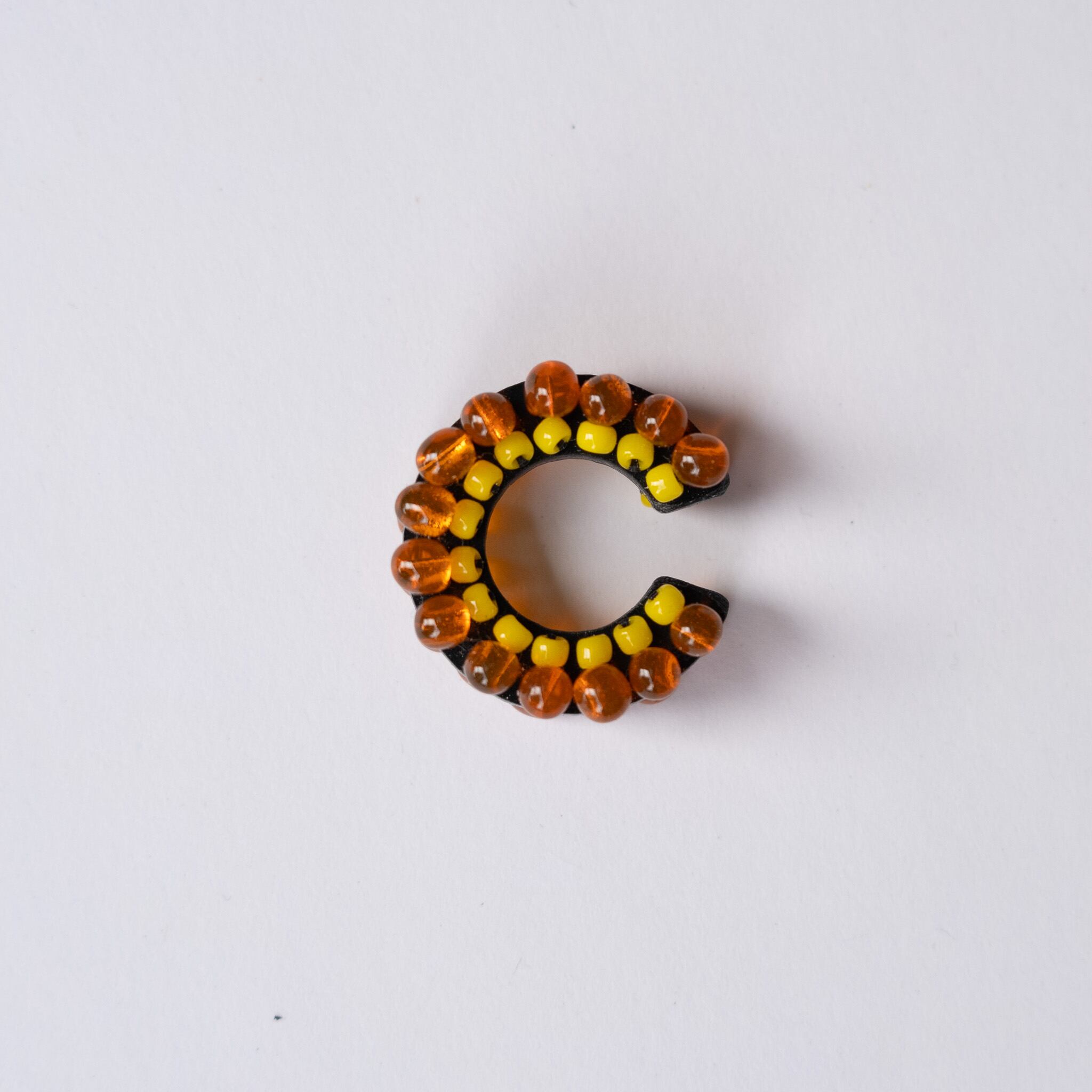 puzzle ring ear cuff [67]