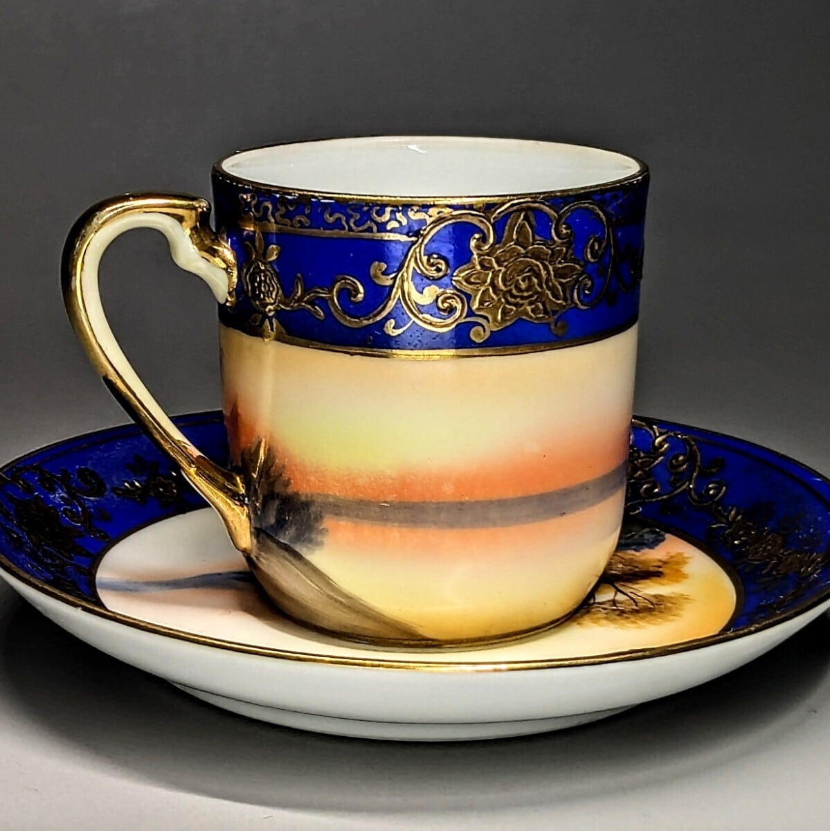 オールドノリタケ 有名パターン 金盛上藍帯イギリス 金彩湖畔白鳥風景 
