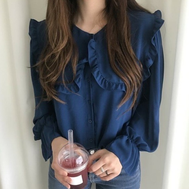 Dark color shirt with a large collar