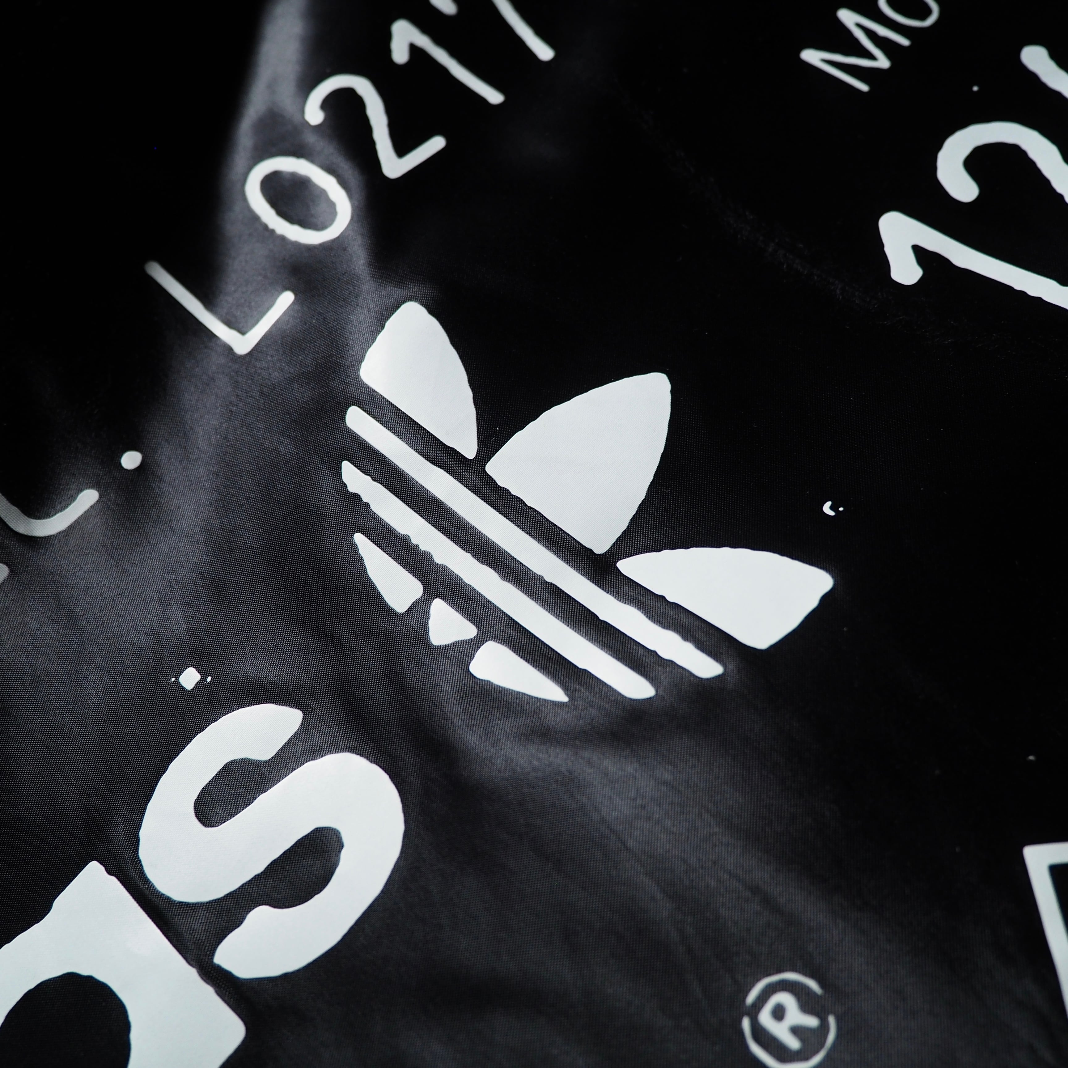 "adidas × ALEXANDER WANG " Black satin nylon coach jacket