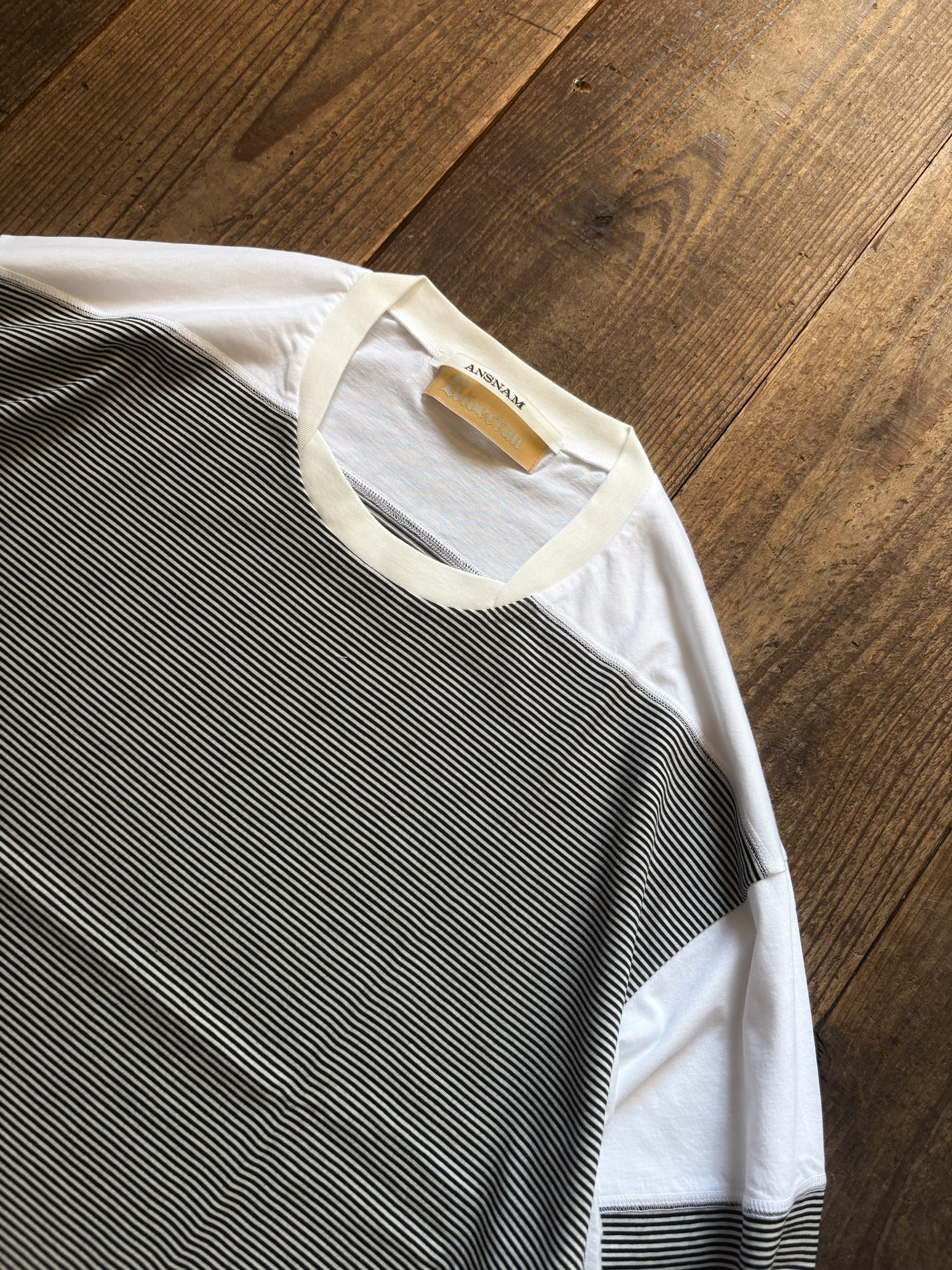 ANSNAM riverrun boarder long t shirt white × black | TALE COCOON
