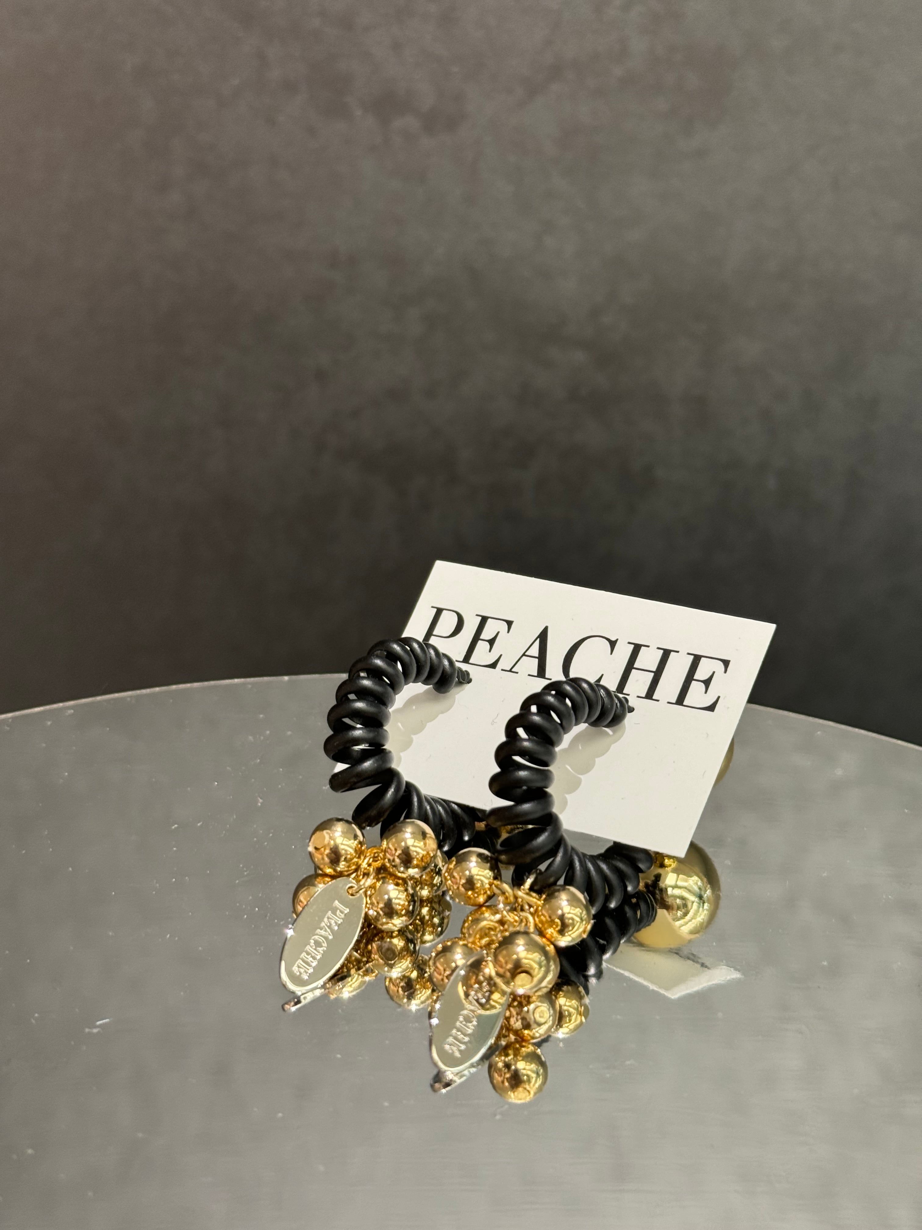 black coil tsubu-tubu gold