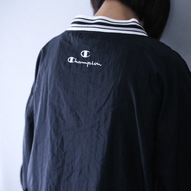 "Champion" monotone coloring over silhouette  nylon pullover