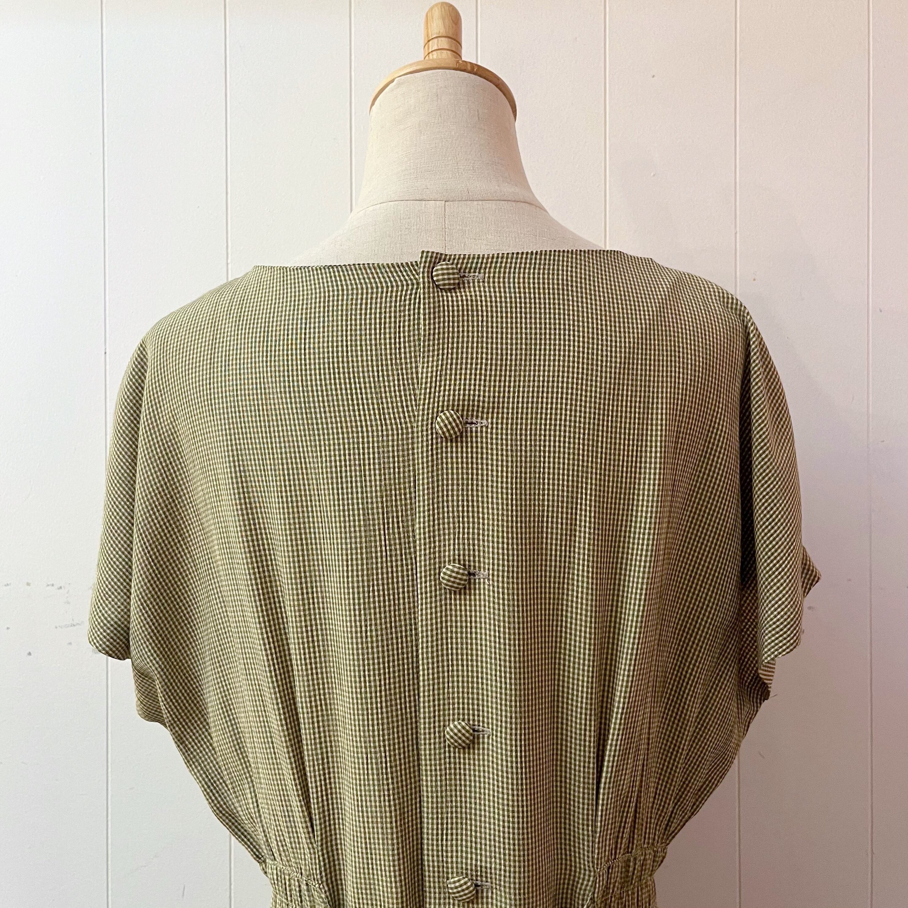 green check back button one-piece