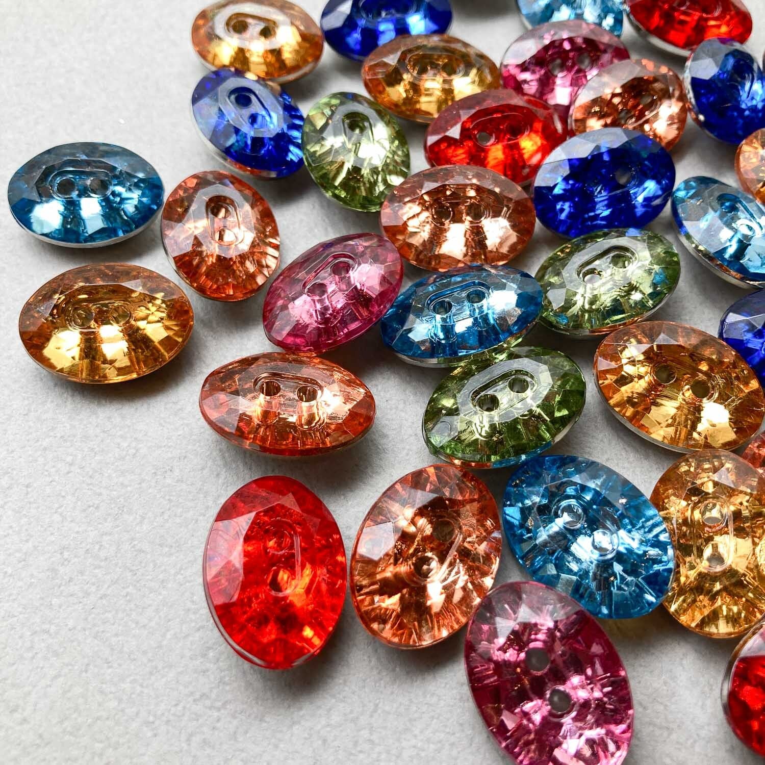 再入荷〉オーバル2穴ビジュー風ボタンS（18mm） | Dua-アクセサリー